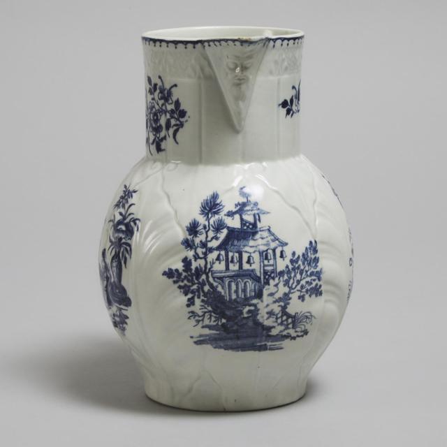 Worcester Blue Printed 'Mother and Child' and 'Temple Bells' Cabbage Leaf and Mask Jug, c.1775
