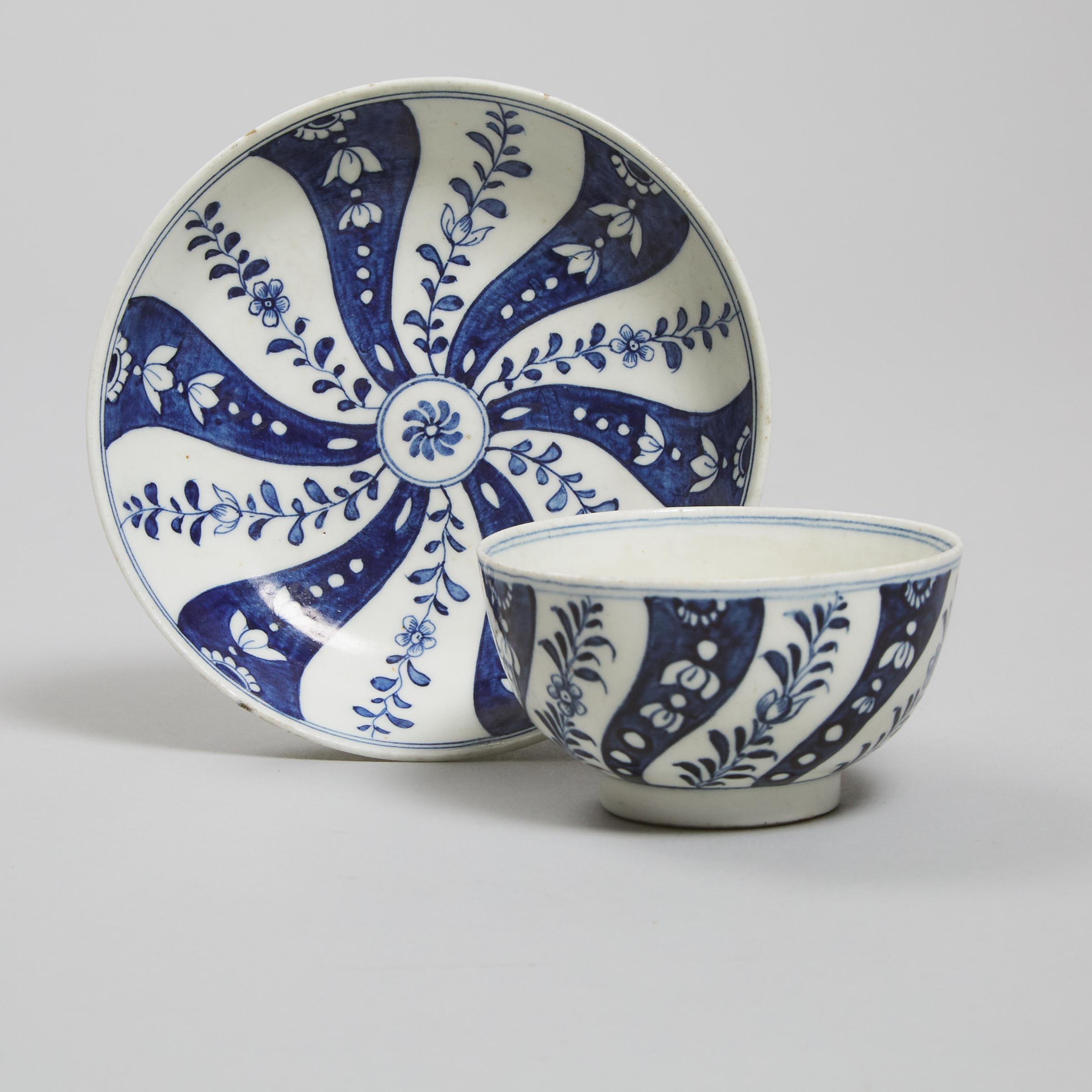 Lowestoft Blue and White Spiral Panels Tea Bowl and Saucer, c.1775-80