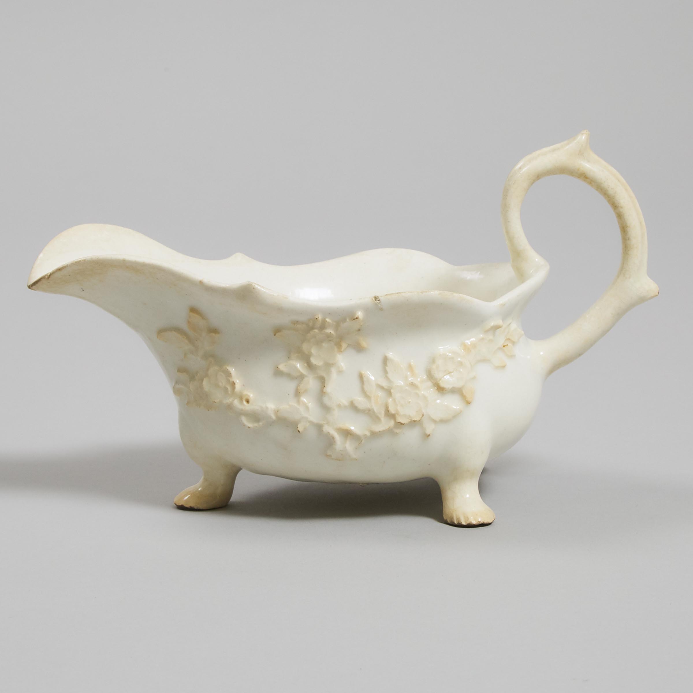 Bow Moulded and White Glazed Prunus Sauce Boat, c.1752-55