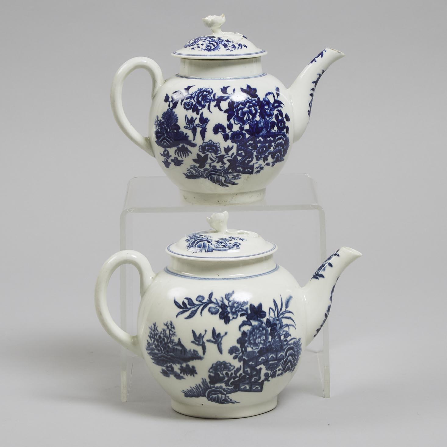 Two Worcester Blue Printed 'Fence' Pattern Teapots, c.1775