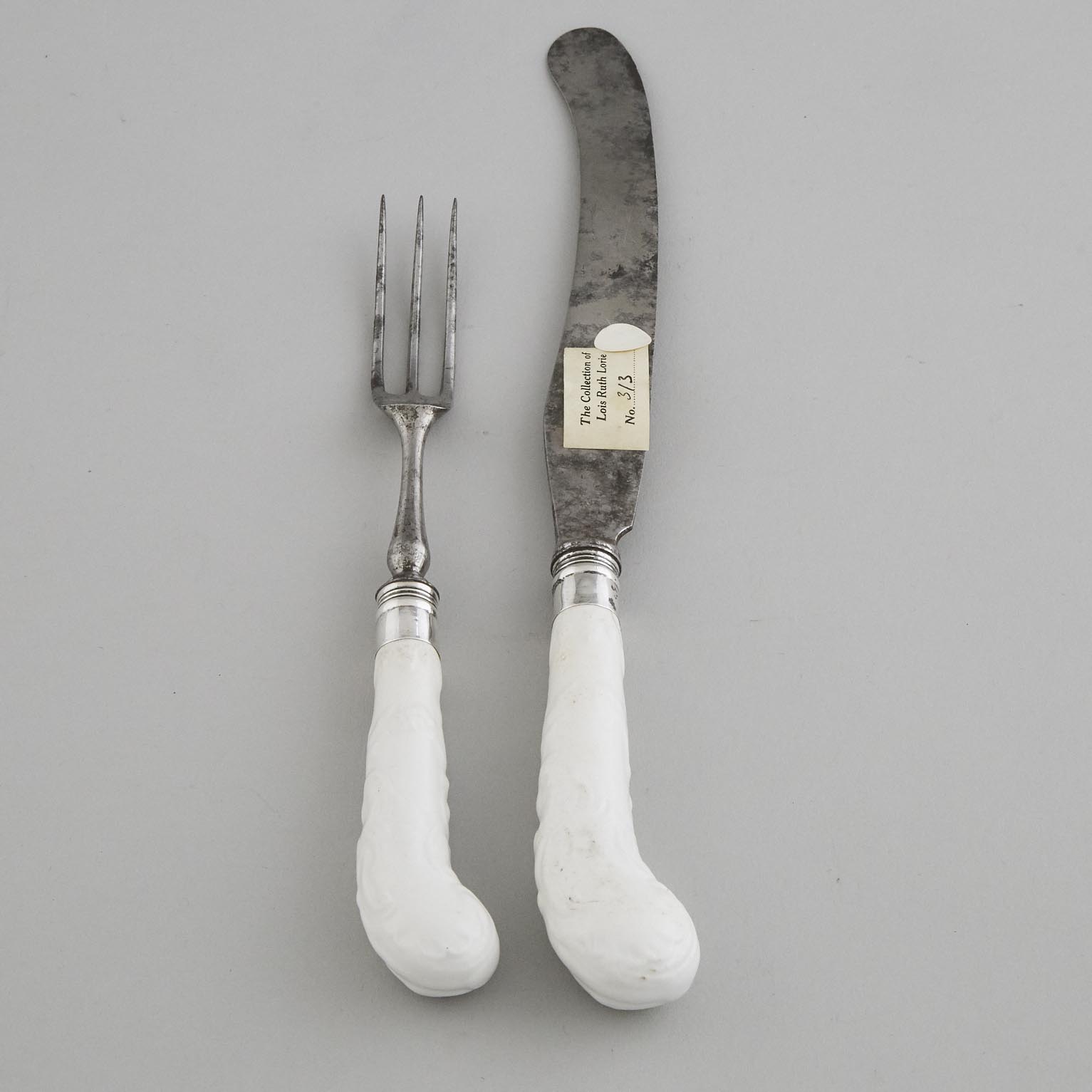 Pair of Bow Moulded and White Glazed Pistol Shaped Knife and Fork Handles, c.1755
