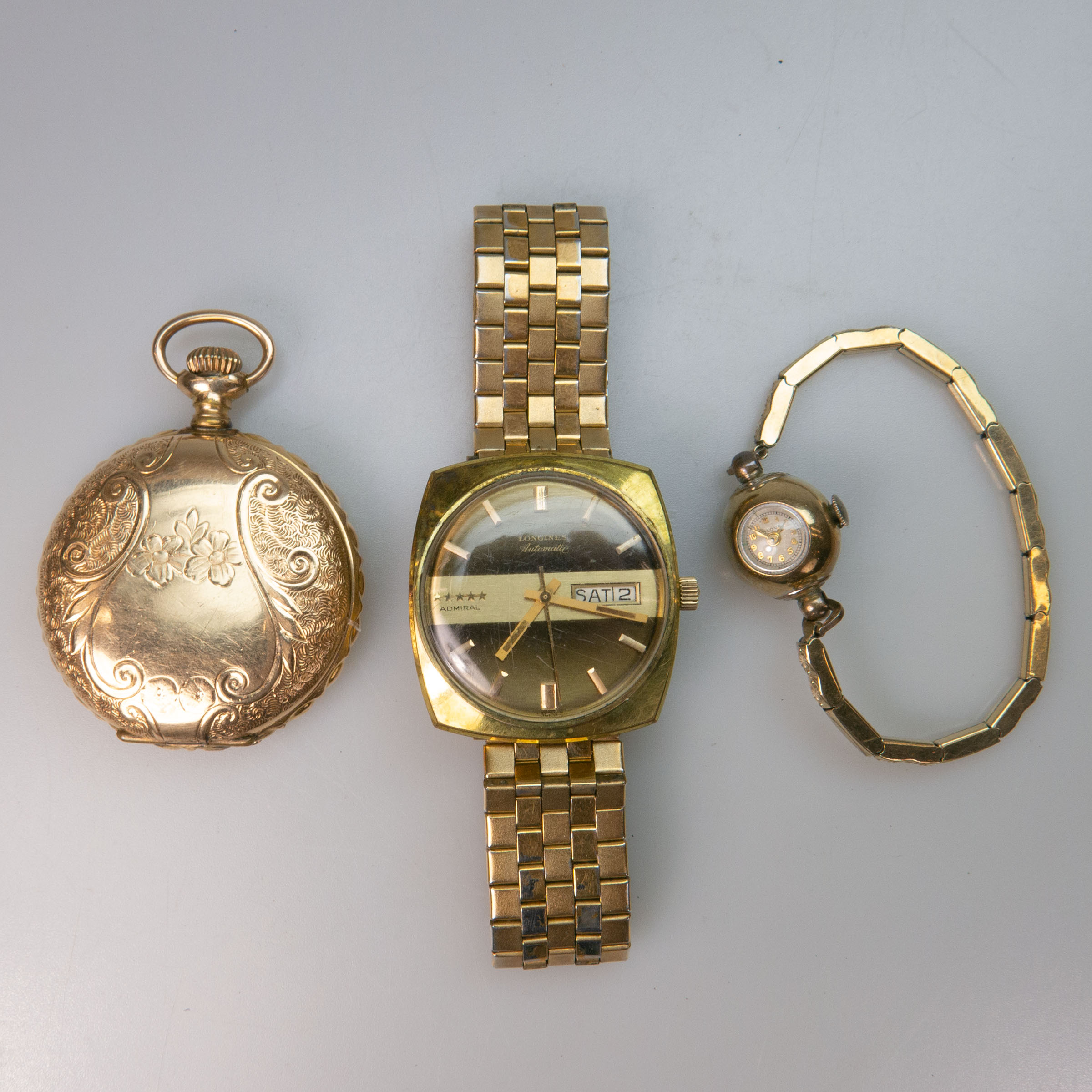Three Various Timepieces