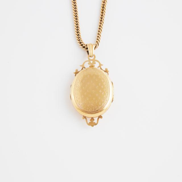 18k Yellow Gold Locket And A 14k Yellow Gold Chain