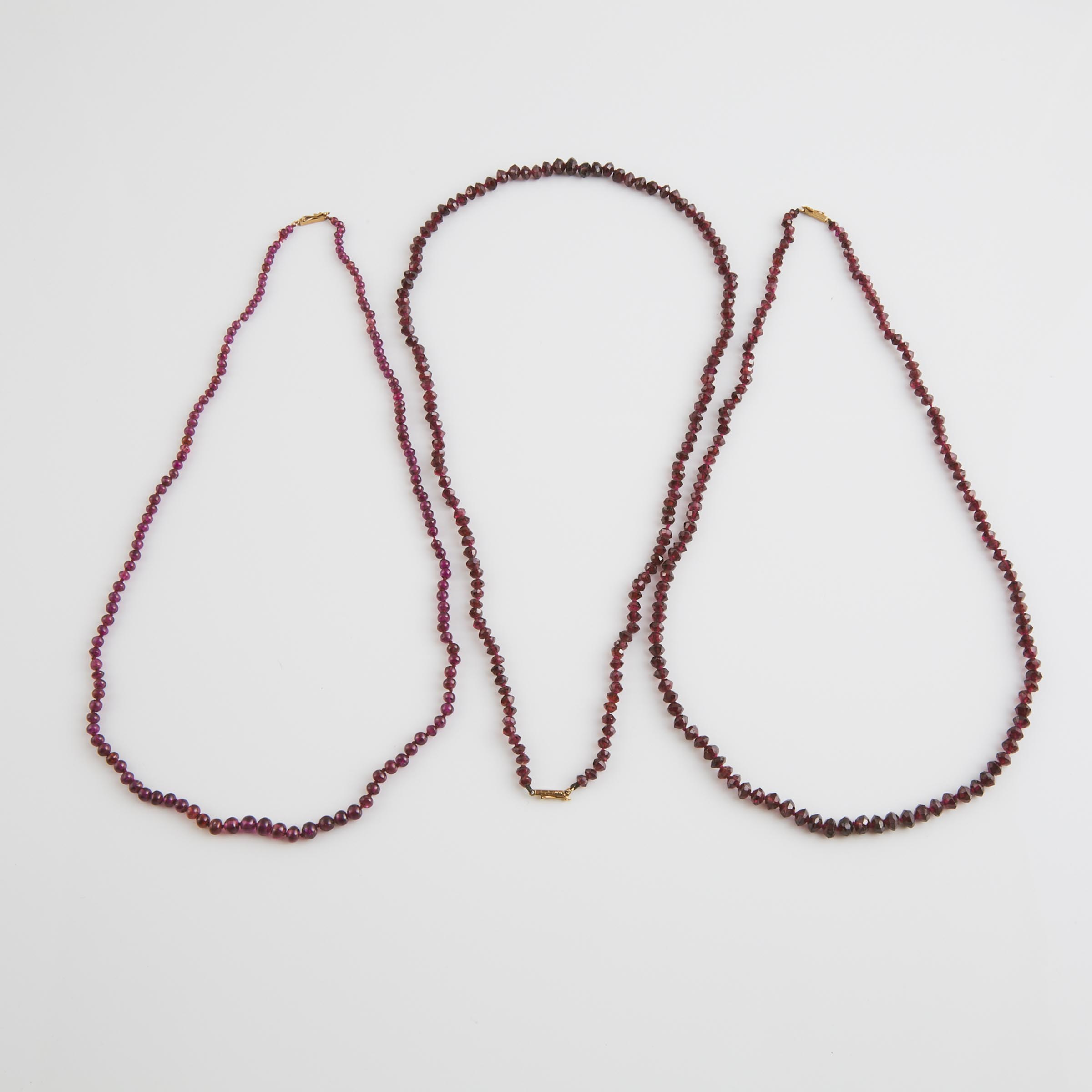 Three Graduated Garnet Bead Necklaces