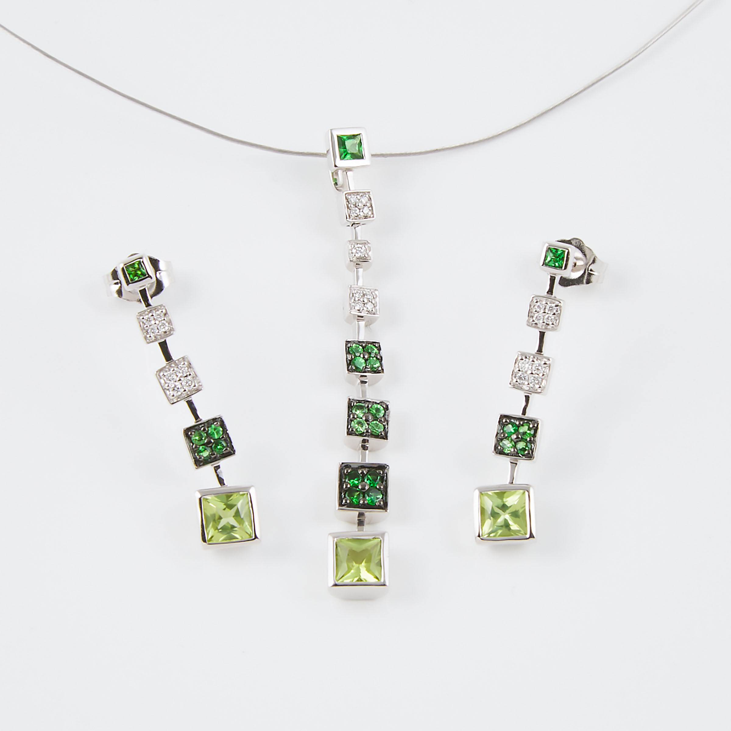 Pair Of 18k White Gold Earrings And A Matching Pendant