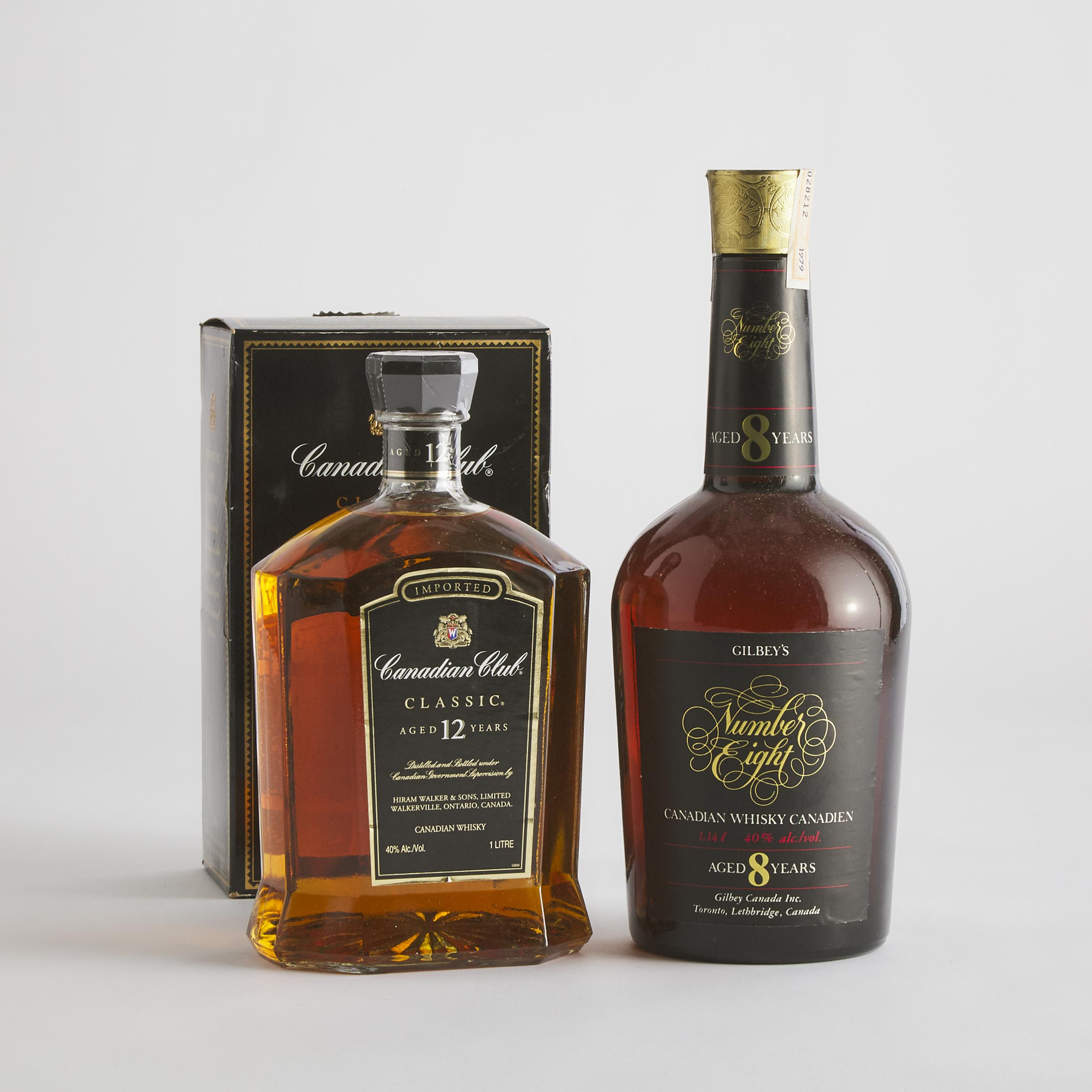 CANADIAN CLUB CLASSIC CANADIAN WHISKY 12 YEARS (ONE 1000 ML)
GILBY'S BLENDED CANADIAN WHISKY NUMBER EIGHT 8 YEARS (ONE 1140 ML)