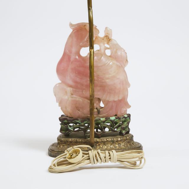 A Large Chinese Rose Quartz Carving of a Phoenix Holding Peonies, Qing Dynasty, 18th/19th Century