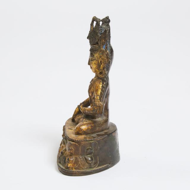 A Gilt Bronze Figure of Akshobhya, Western Tibet, 13th/14th Century
