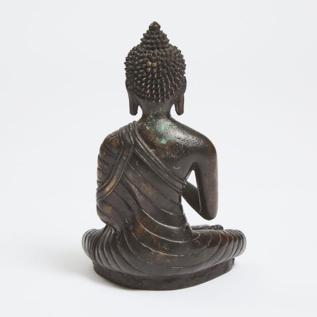 A Tibetan Bronze Seated Figure of Buddha, 18th Century or Later