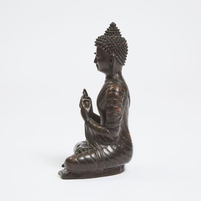 A Tibetan Bronze Seated Figure of Buddha, 18th Century or Later