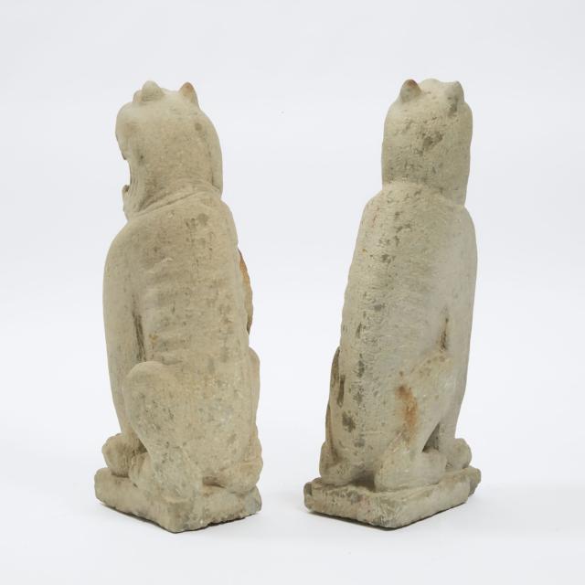 A Pair of Large Stone Seated Figures of Tigers, Northwest China, Possibly Yuan/Ming Dynasty