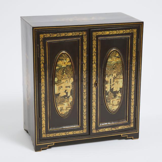A Chinese Export Black and Gilt Lacquered Tabletop Cabinet and Jewellery Box, 19th Century