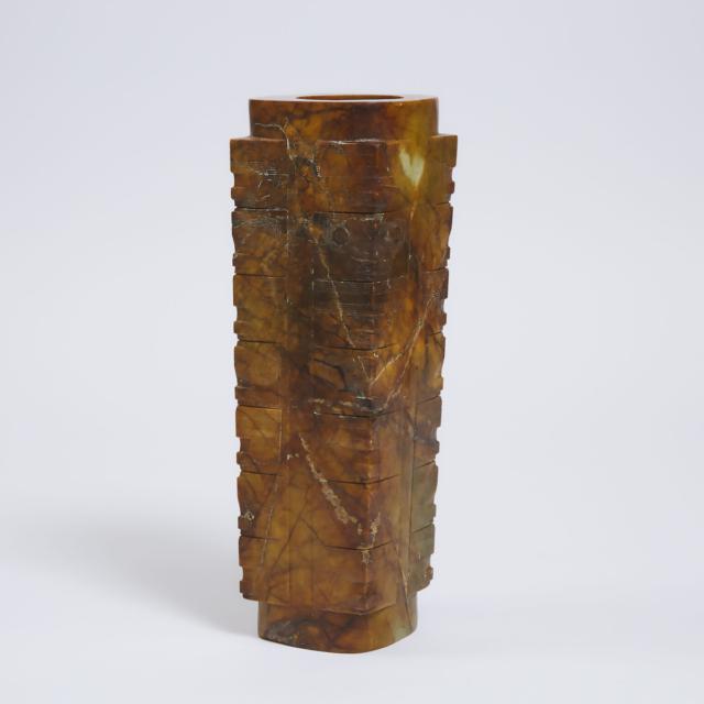 A Large Neolithic-Style Seven-Tiered Yellow and Russet Jade Cong, Ming Dynasty or Later