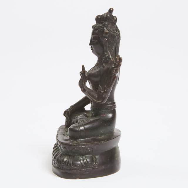 A Small Tibetan Bronze Figure of Green Tara, 18th/19th Century