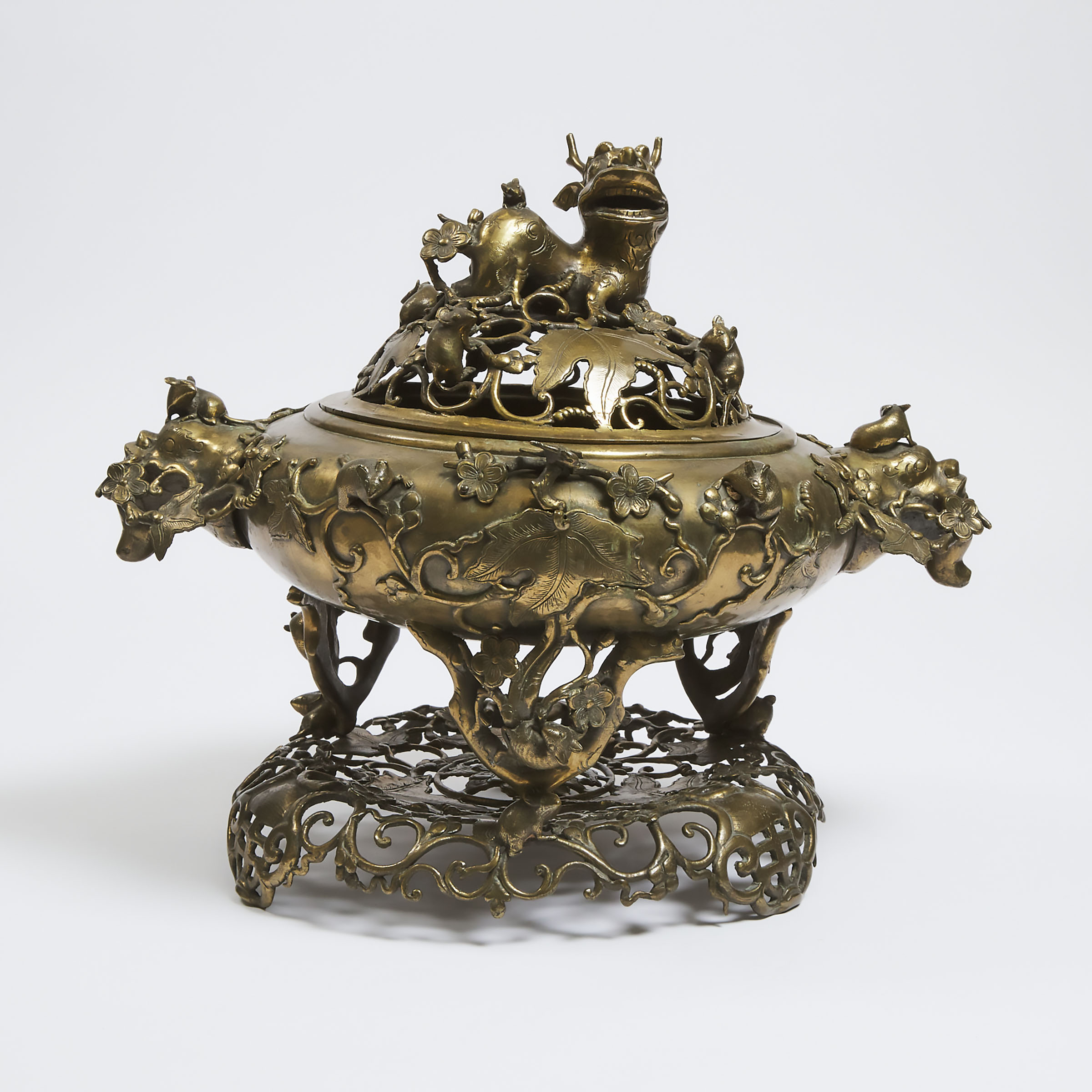 A Large Gilt Bronze 'Qilin' Censer, Cover and Stand, Xuande Mark, Qing Dynasty