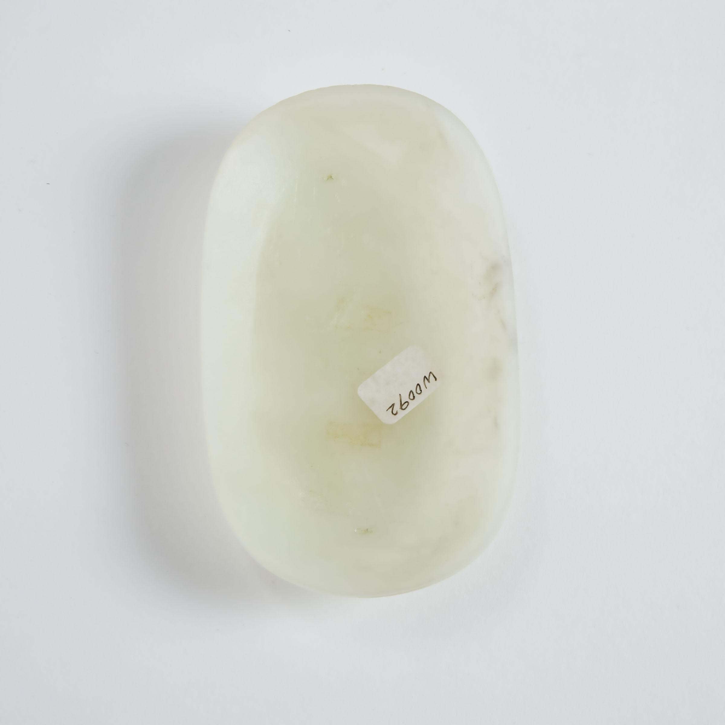 A White Jade 'Figural Landscape' Oval Plaque, Qing Dynasty, 18th/19th Century