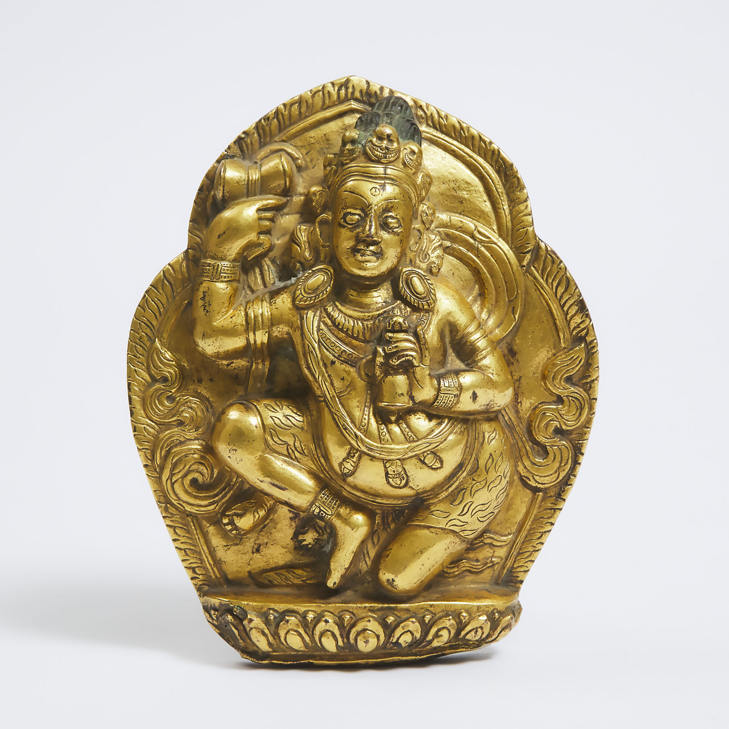 A Gilt Bronze Repoussé Plaque of Mahakala, Tibet, 17th Century