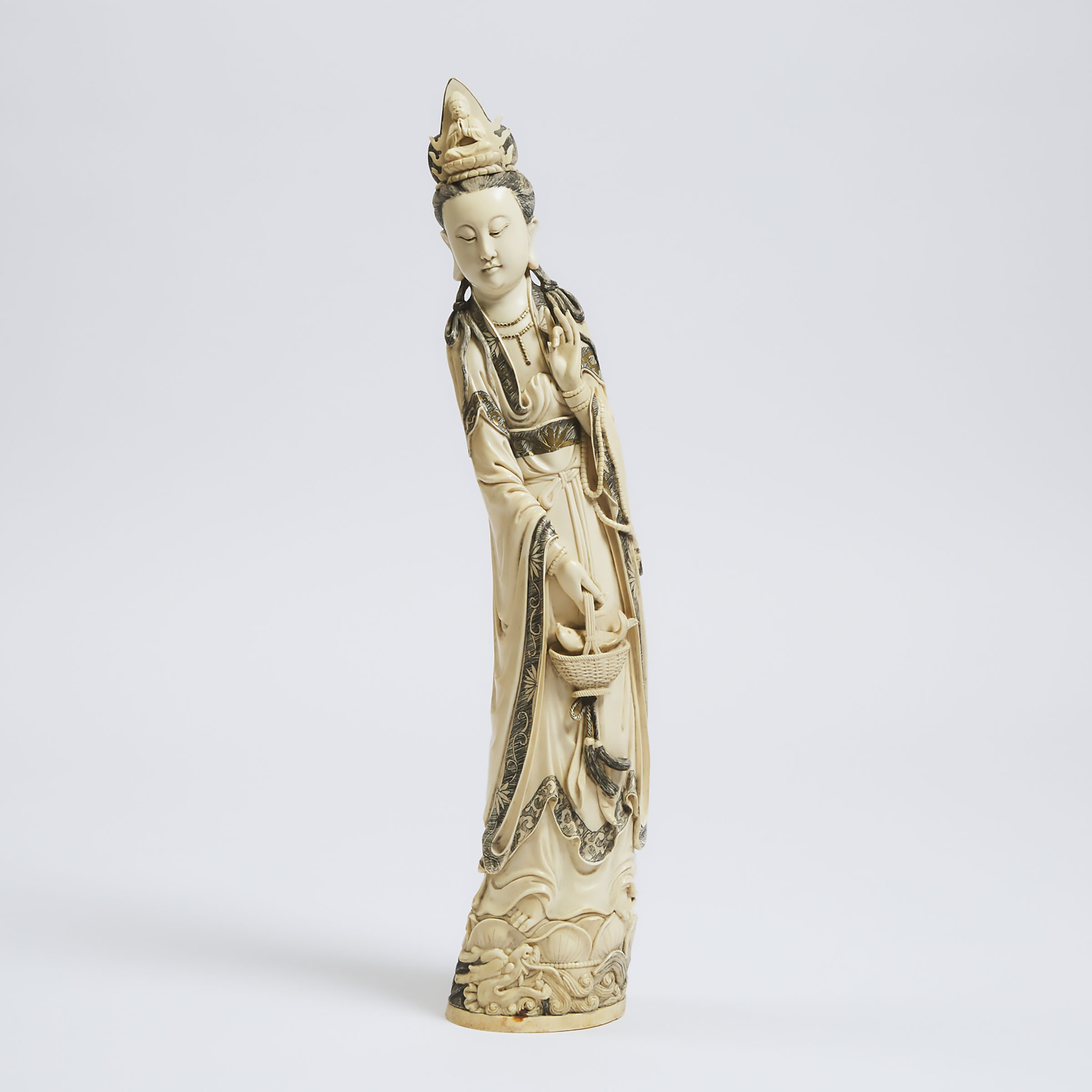 A Large Ivory Figure of Guanyin Holding a Basket With Fish, Early to Mid 20th Century
