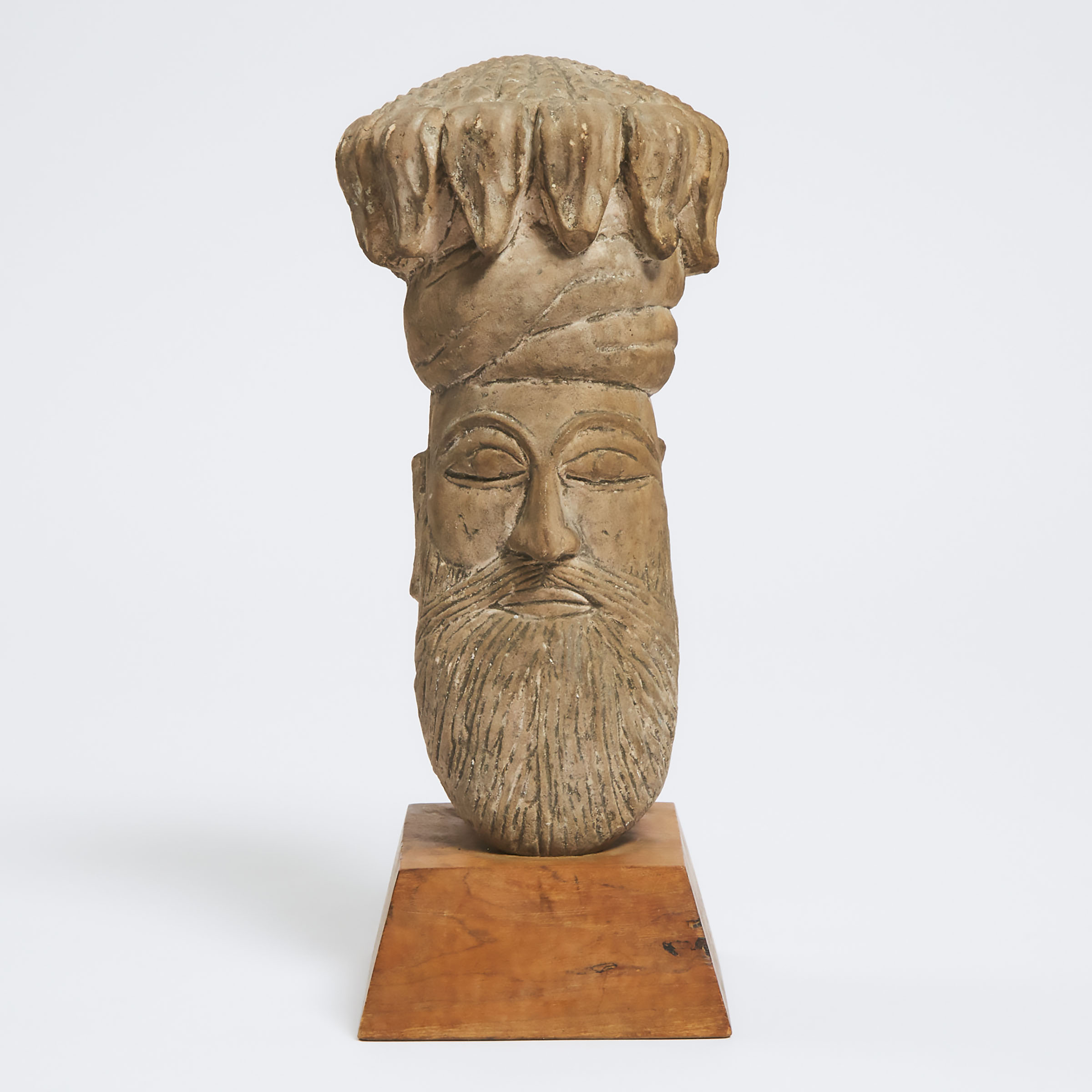 An Indian Stone Head of a King with Turban, 18th Century or Later