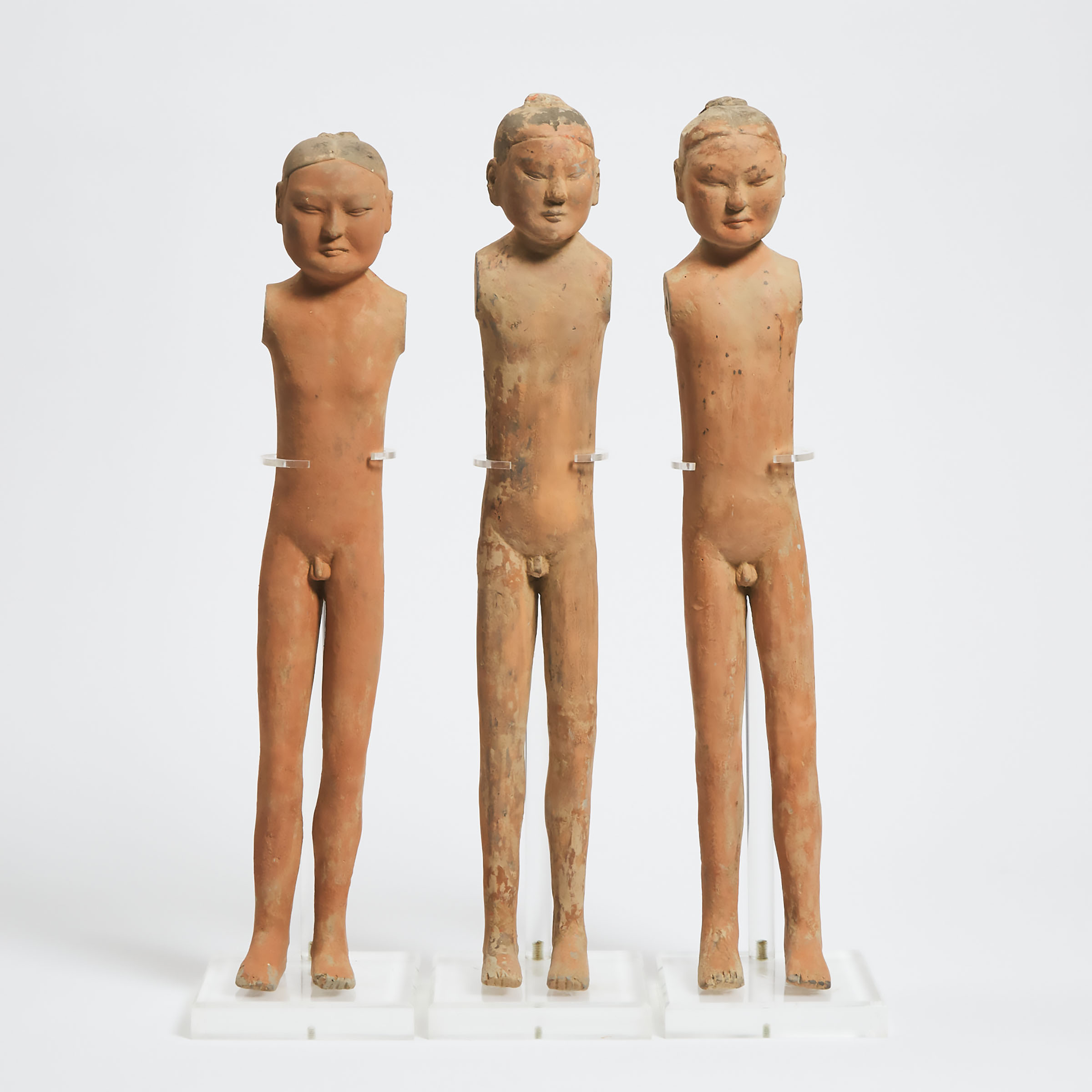 A Group of Three Pottery Figures of Male Warriors, Han Dynasty (206 BC-220 AD)