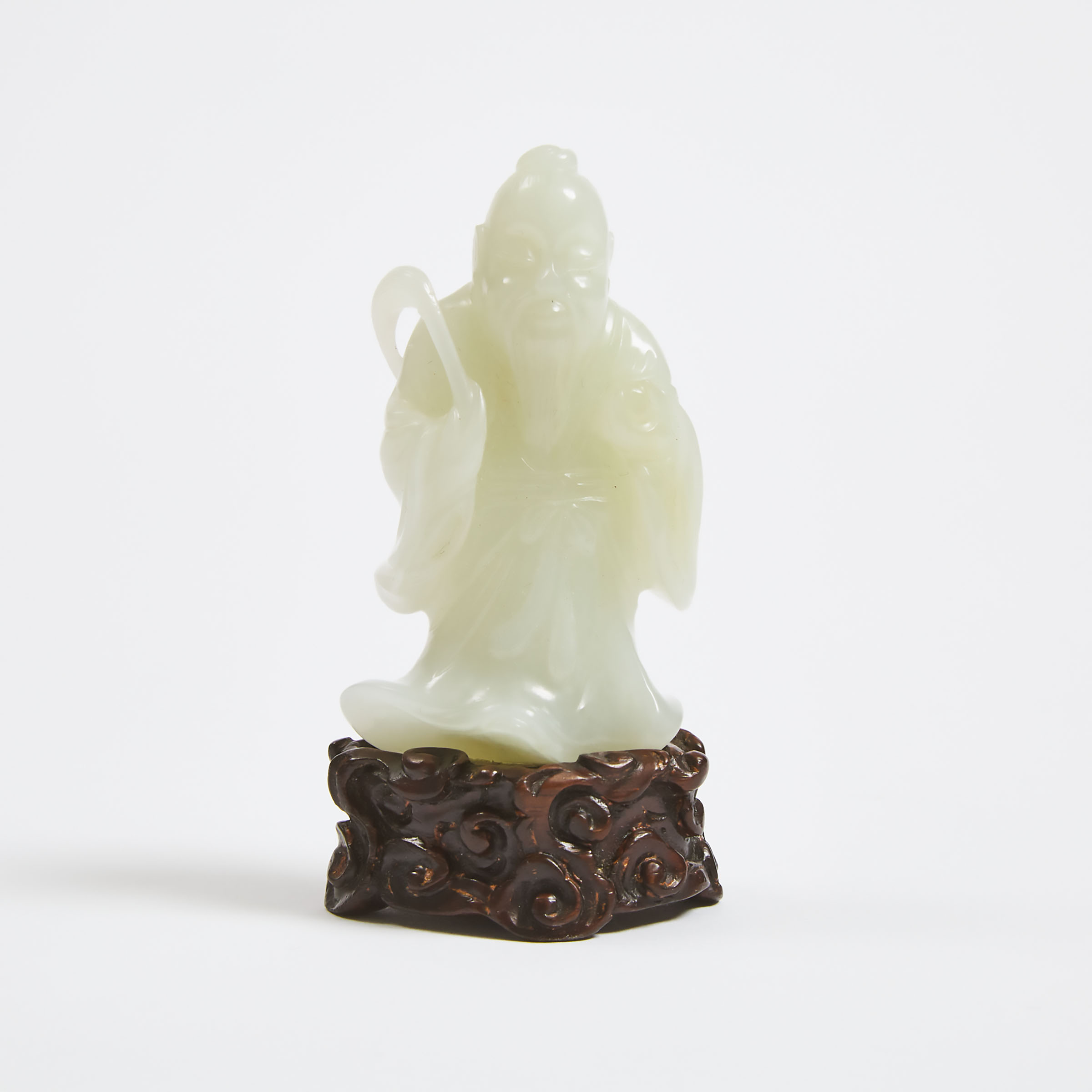 A White Jade Figure of an Immortal, Qing Dynasty, 18th/19th Century