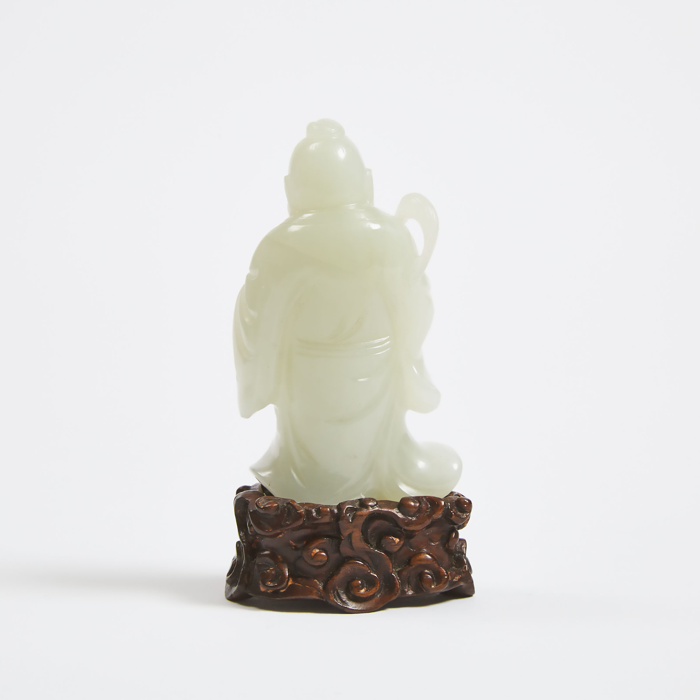 A White Jade Figure of an Immortal, Qing Dynasty, 18th/19th Century
