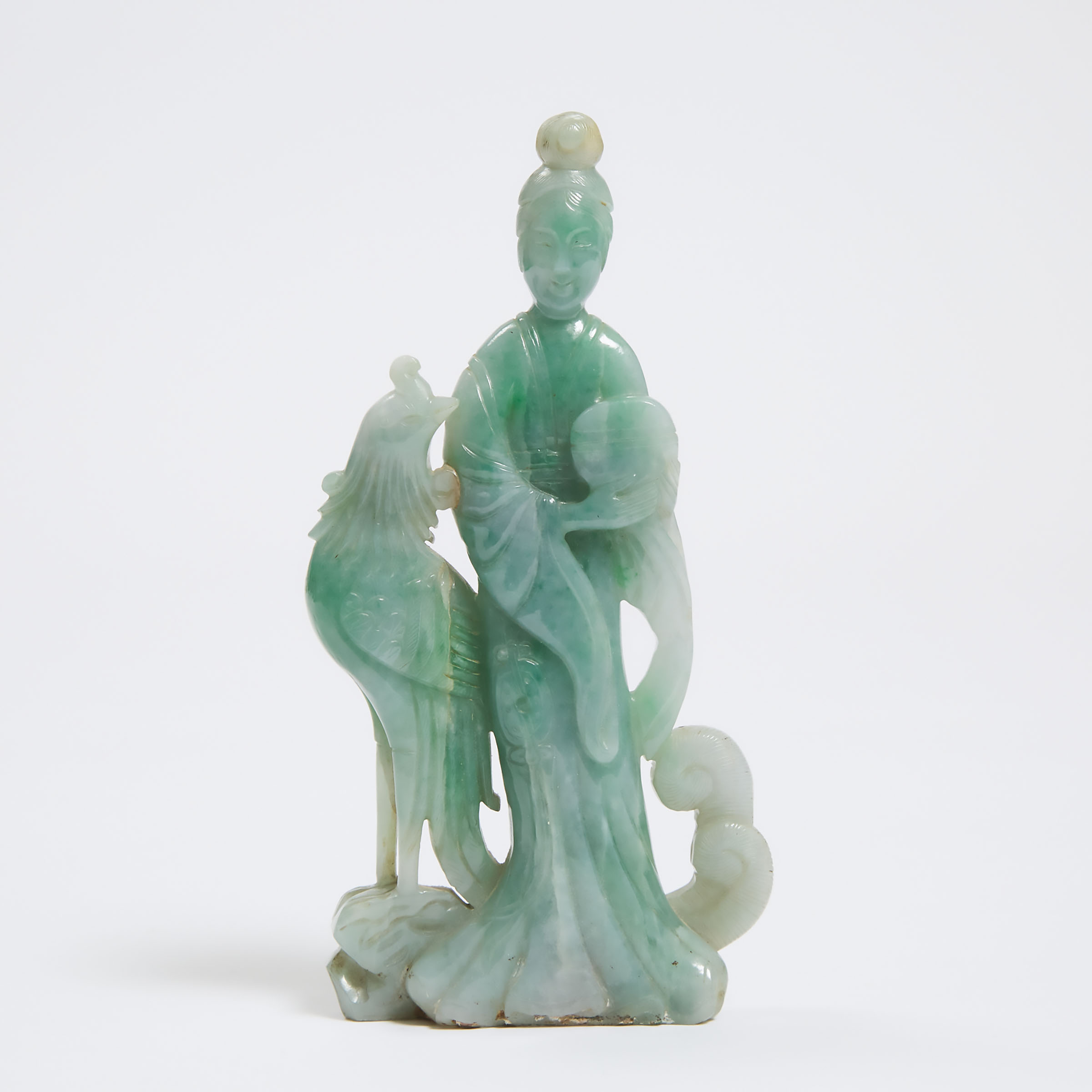 A Jadeite Carving of a 'Magu' with Phoenix, Late 19th/Early 20th Century
