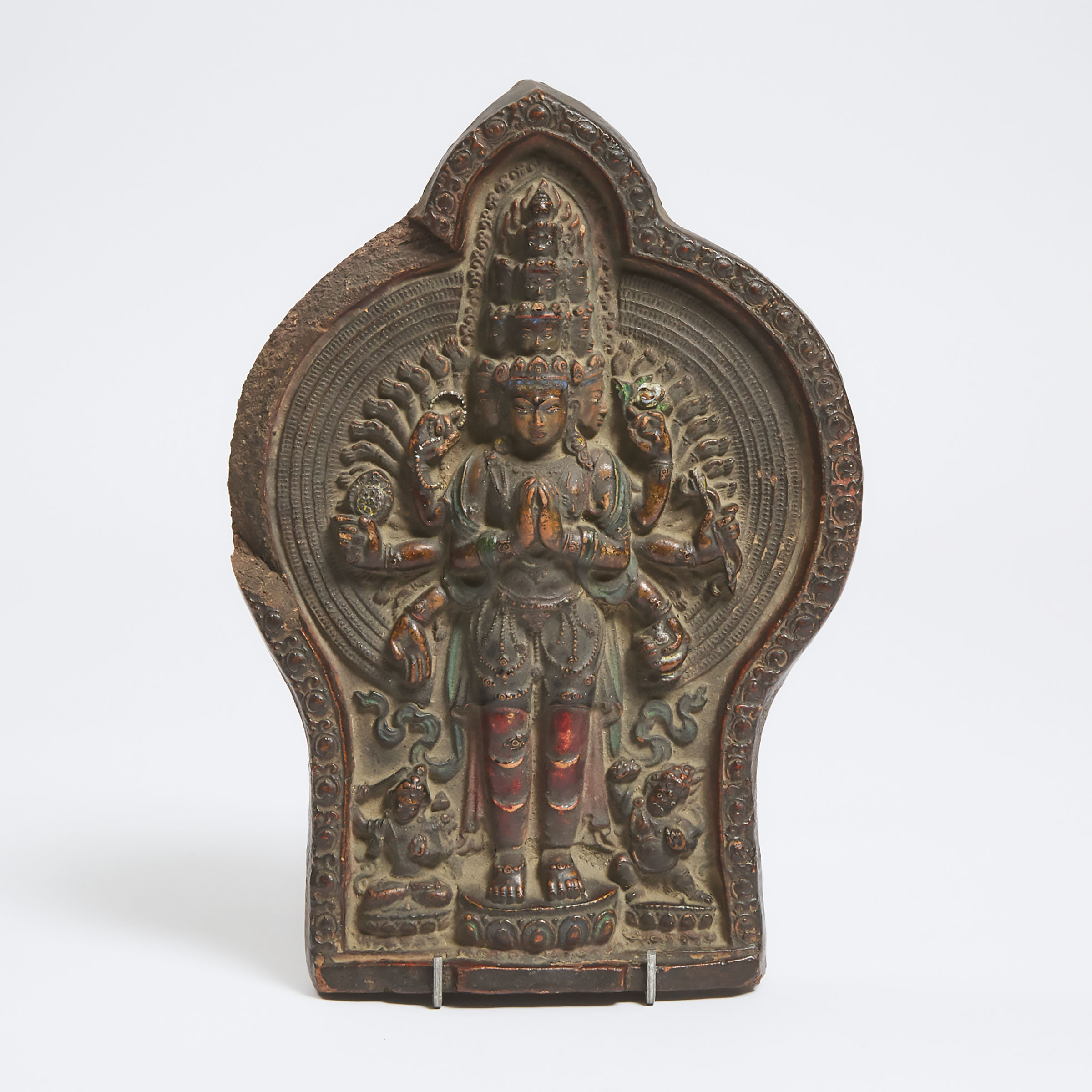 A Large Tibetan Terracotta Plaque of Avalokiteshvara with Manjushri and Vajrapani, 18th/19th Century