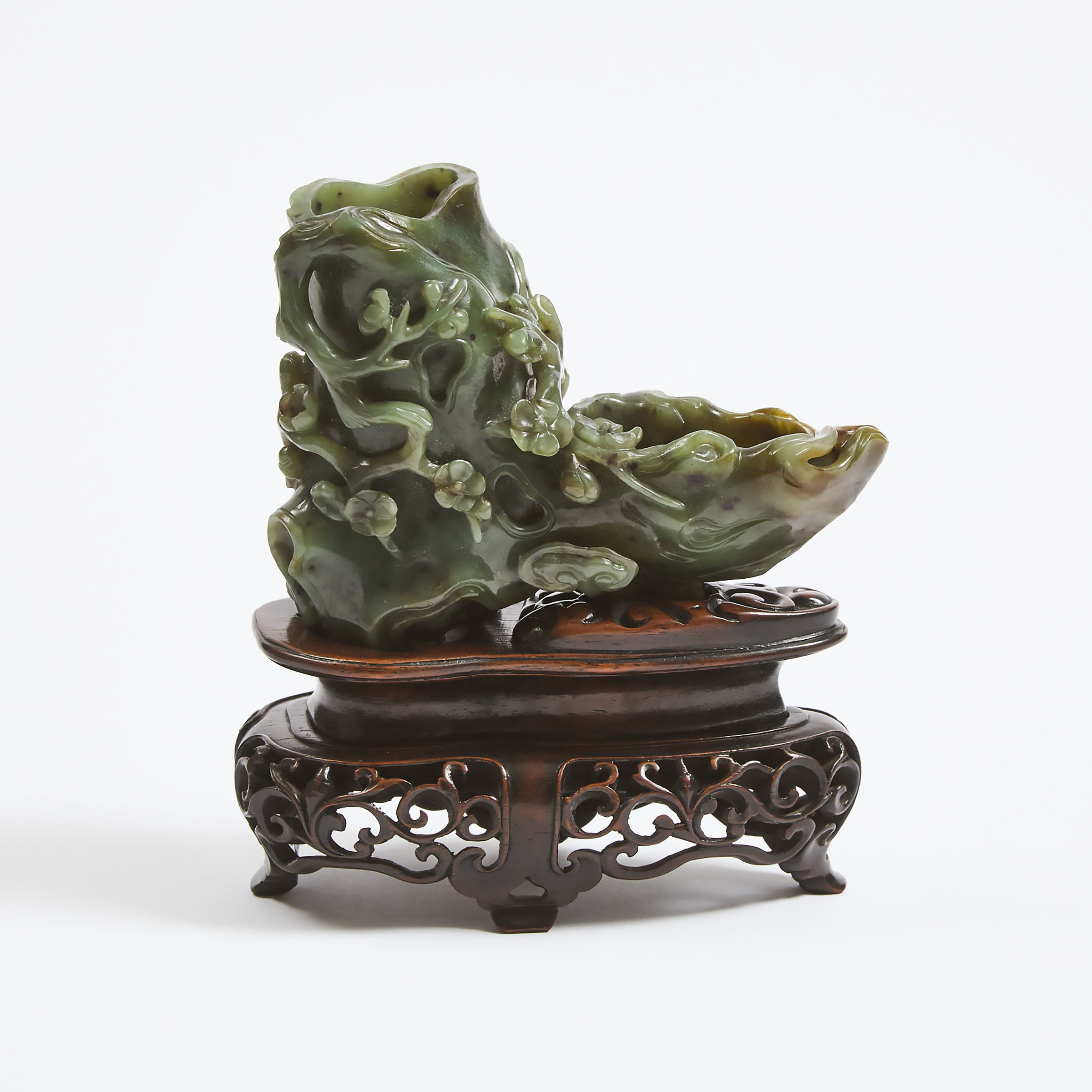 A Finely Carved Spinach Jade Trunk-Form Vase, 18th Century