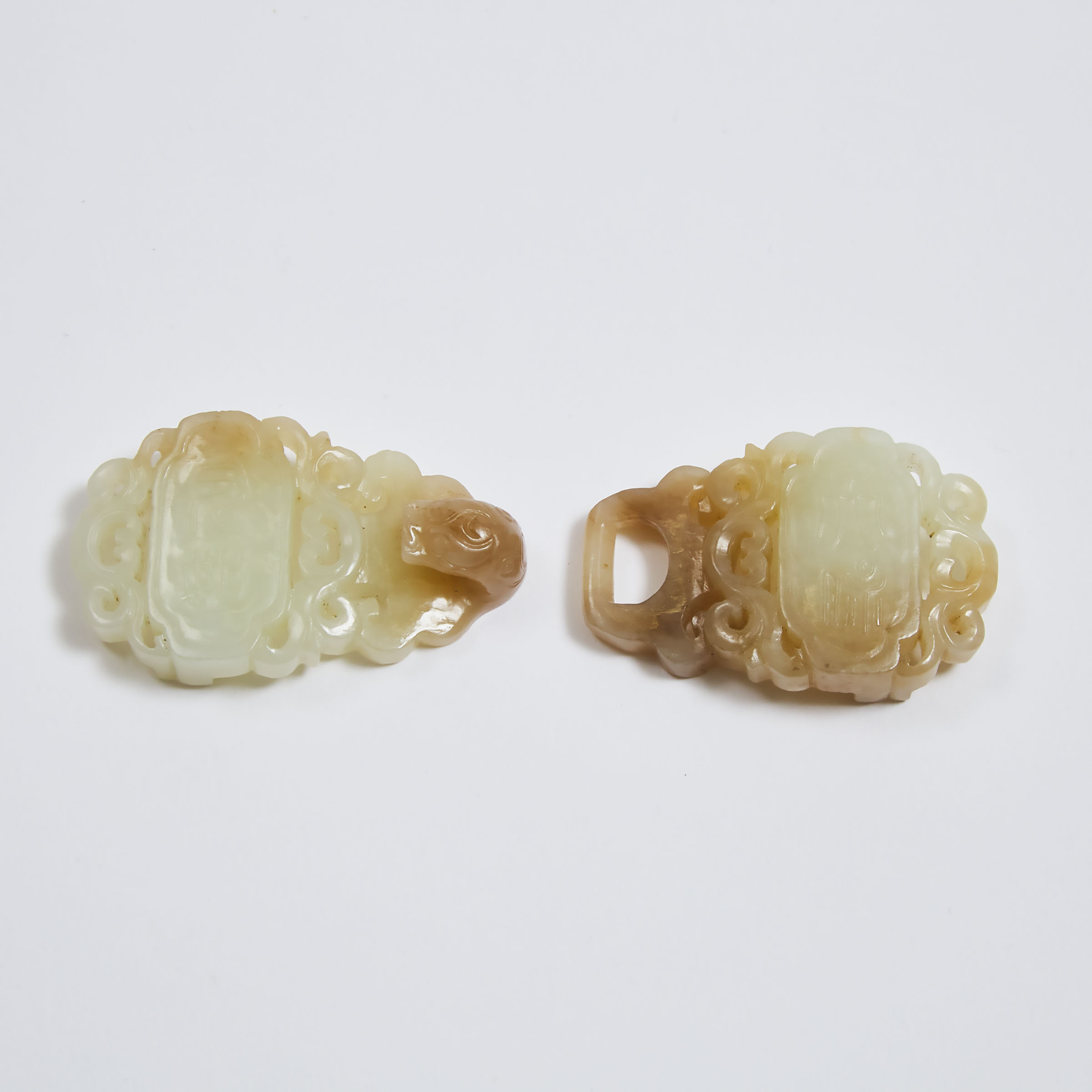 A White and Russet Jade Openwork 'Chilong' Belt Hook, 18th/19th Century