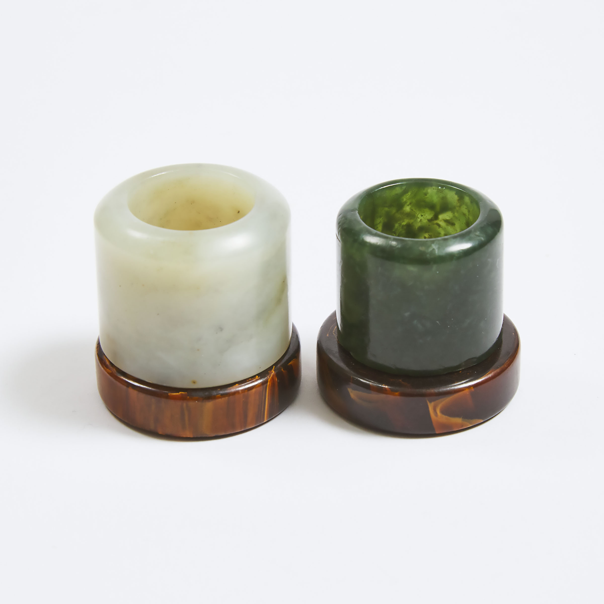 Two Jade Archer's Rings With Stands, Qing Dynasty, 19th Century