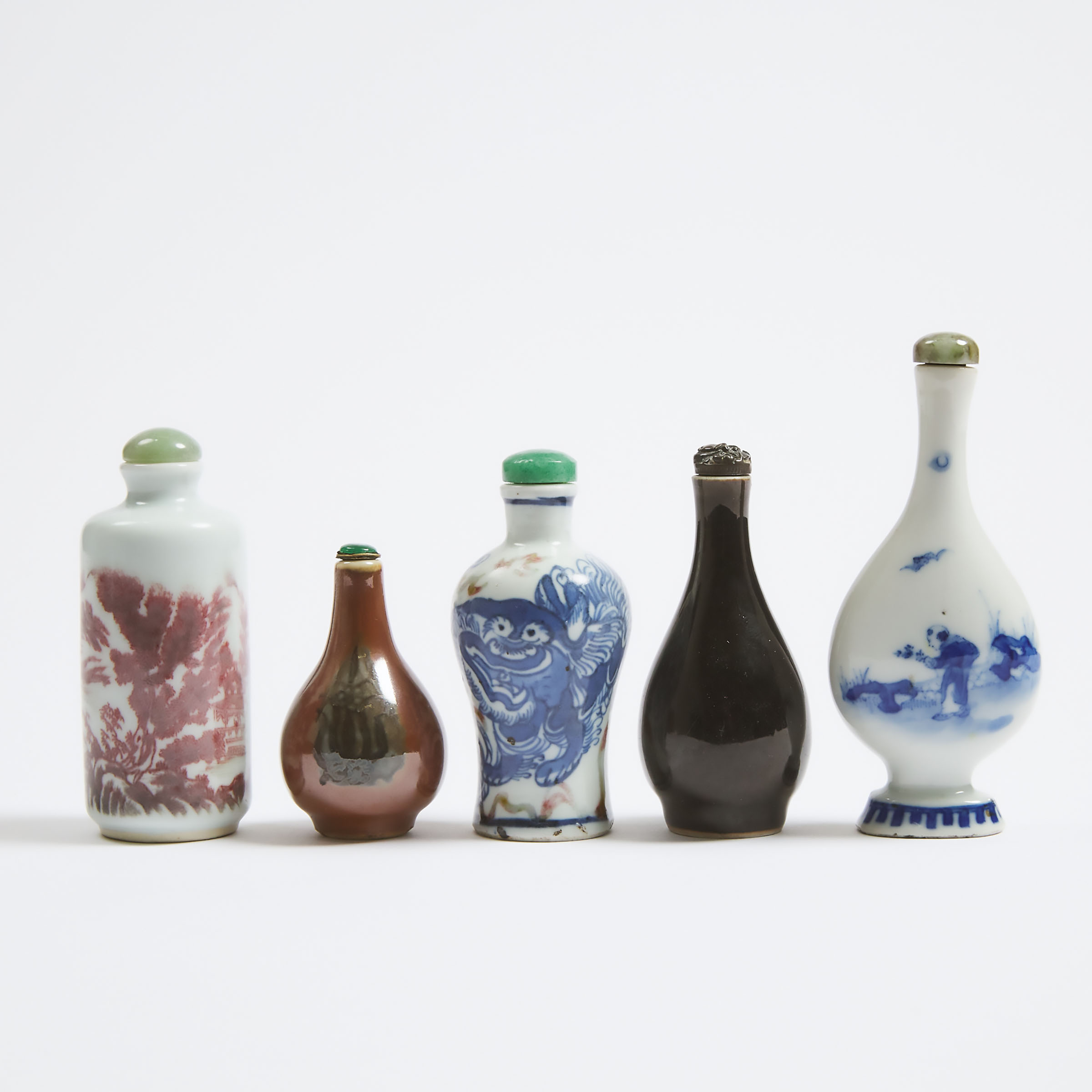 A Group of Five Porcelain Snuff Bottles, Qing Dynasty, 19th Century