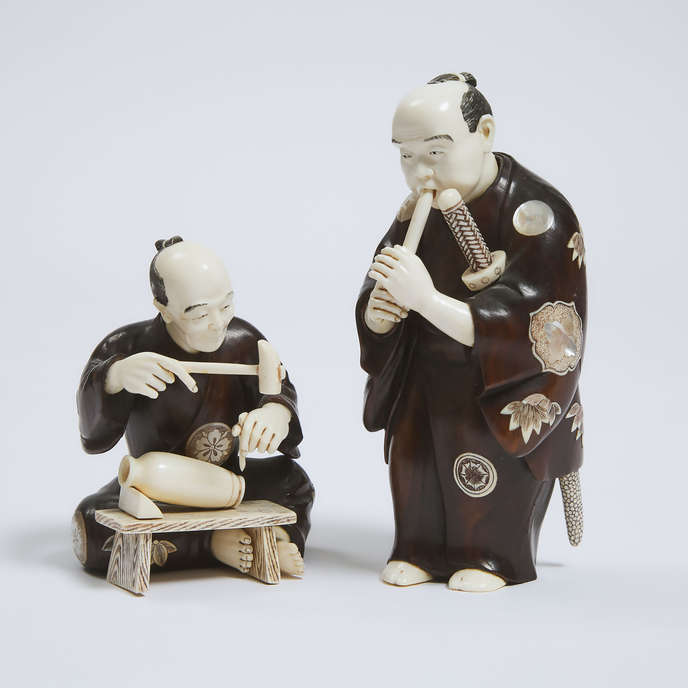 Two Wood and Ivory Okimono of a Samurai and a Craftsman, One Signed Gyokko, Meiji Period (1868-1912)