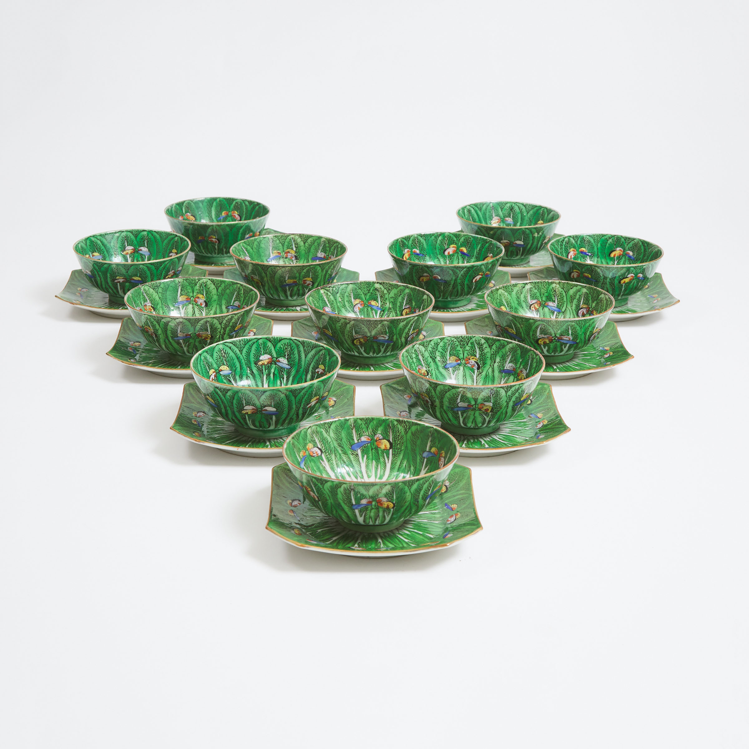 A Set of Twenty-Four Chinese Export 'Cabbage Leaf' Pattern Bowls and Dishes, Early 20th Century