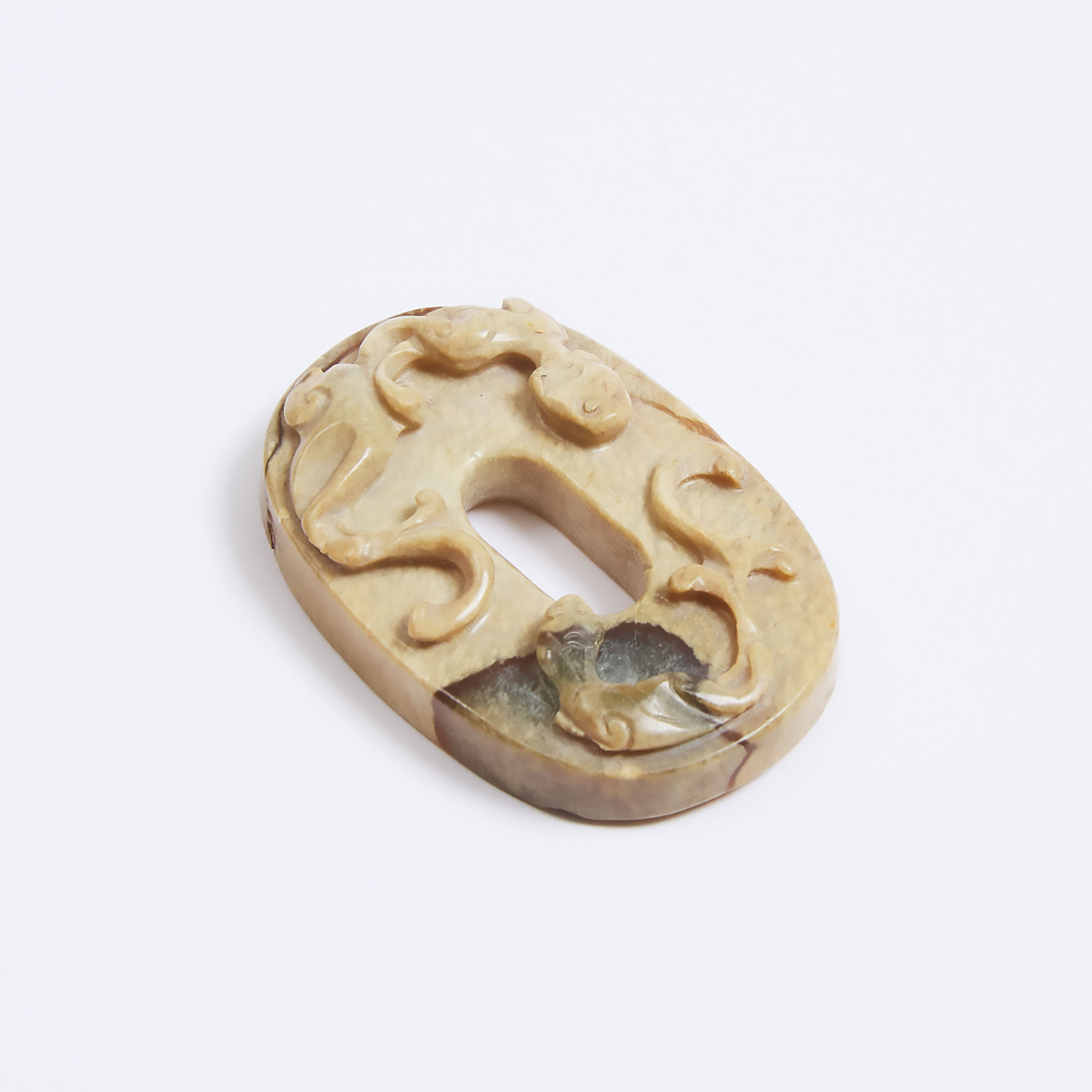 A Creamy and Black Jade 'Chilong' Bi Disc, Yuan/Ming Dynasty, 13th-16th Century