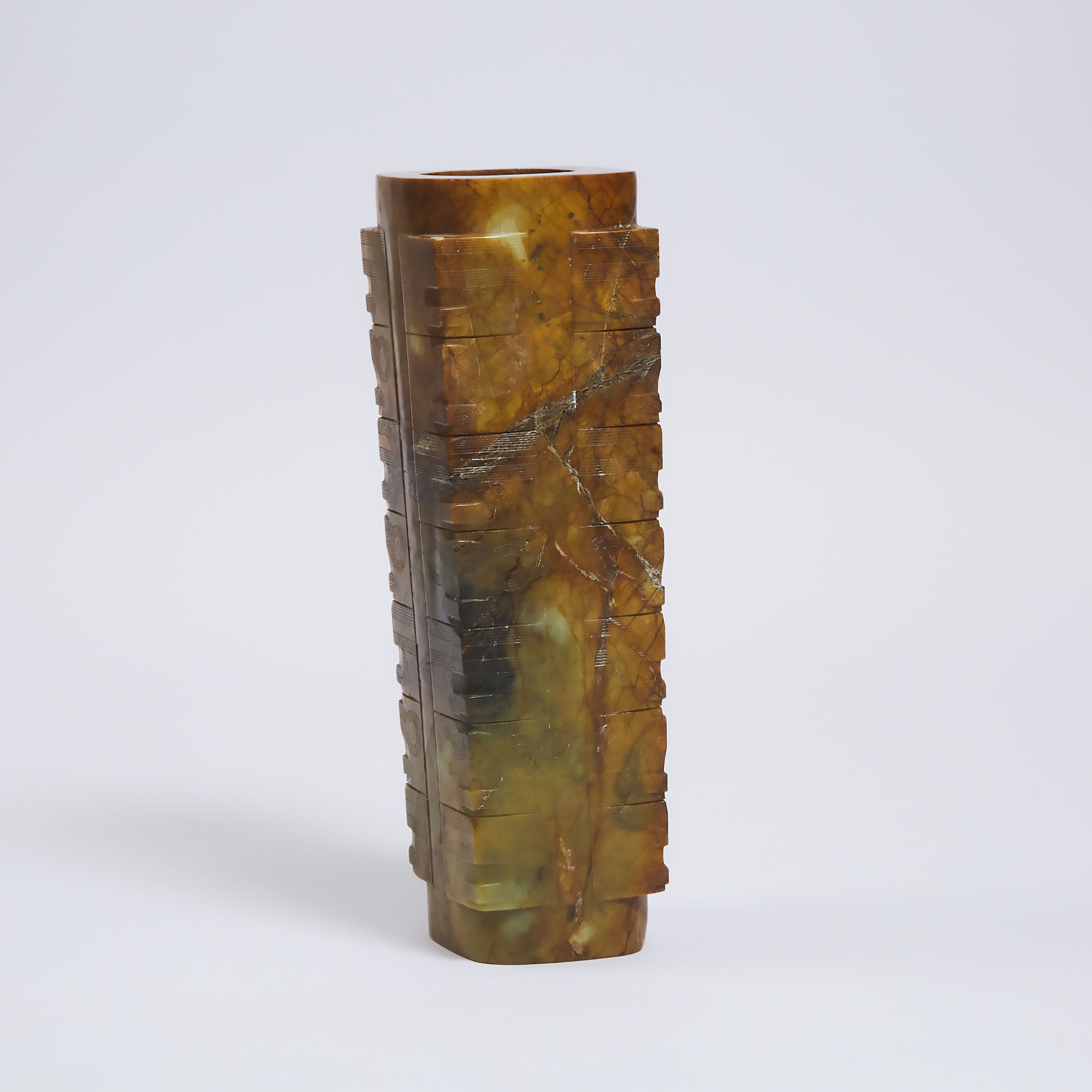 A Large Neolithic-Style Seven-Tiered Yellow and Russet Jade Cong, Ming Dynasty or Later