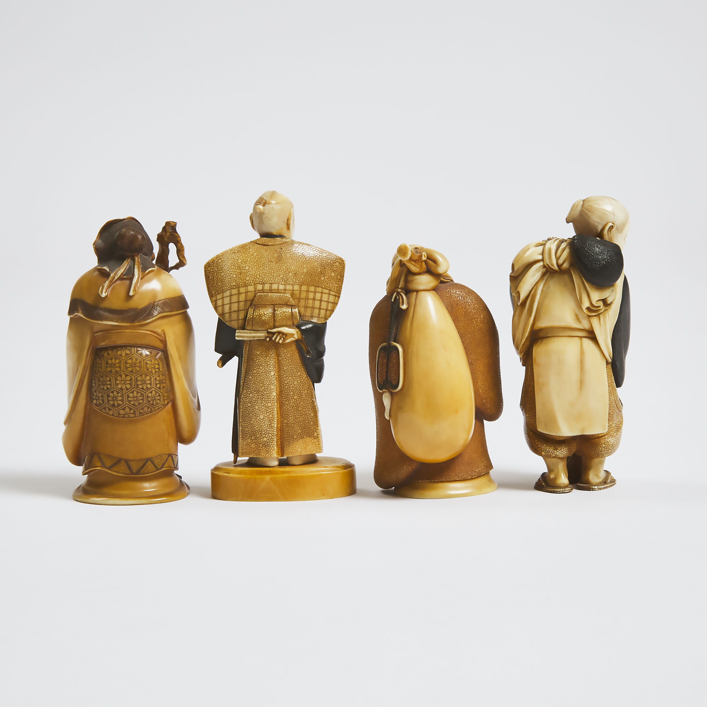 Four Tinted Ivory Okimono Figures, Signed, Meiji-Showa Period