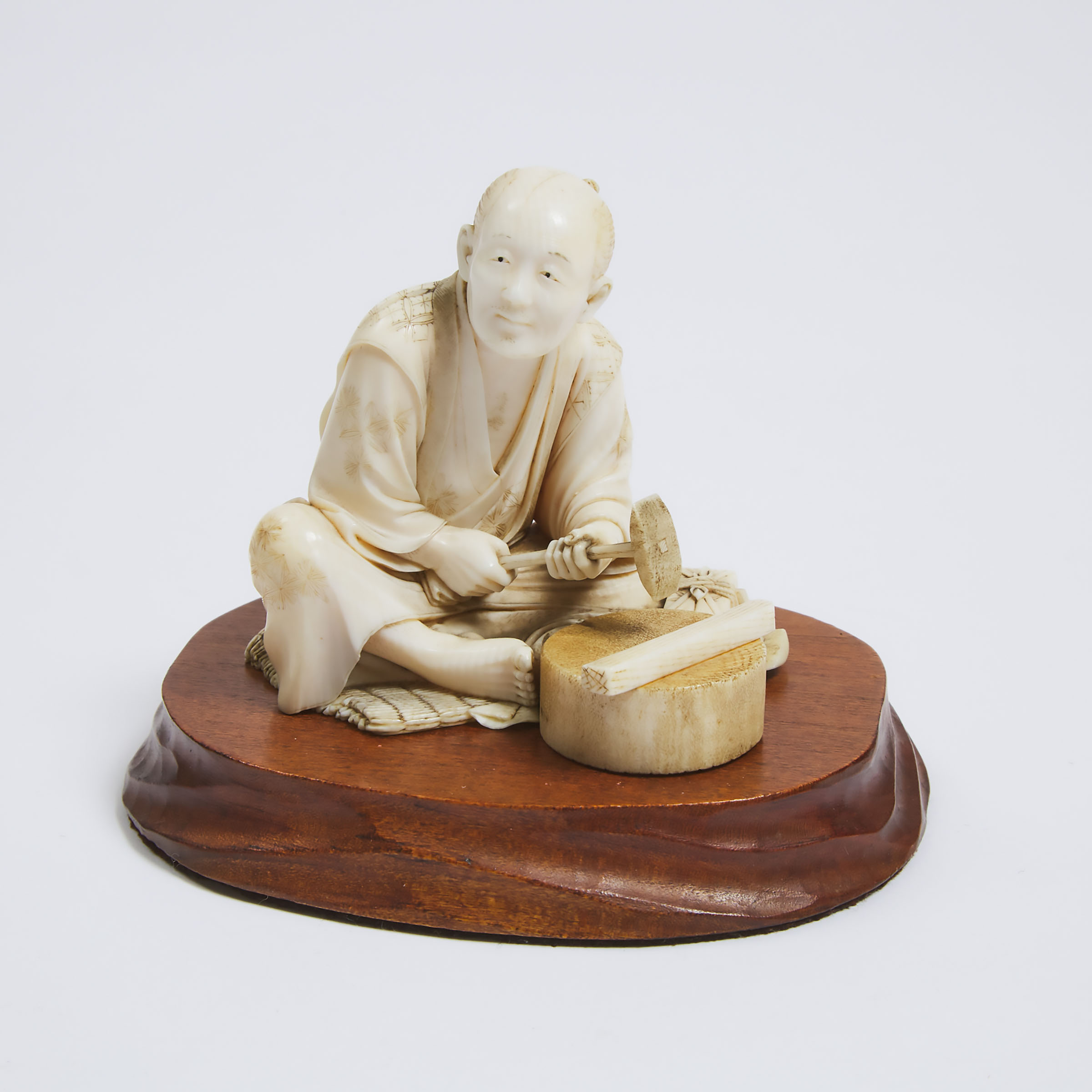 An Ivory Okimono of a Craftsman, Signed Seirin, Meiji Period (1868-1912)
