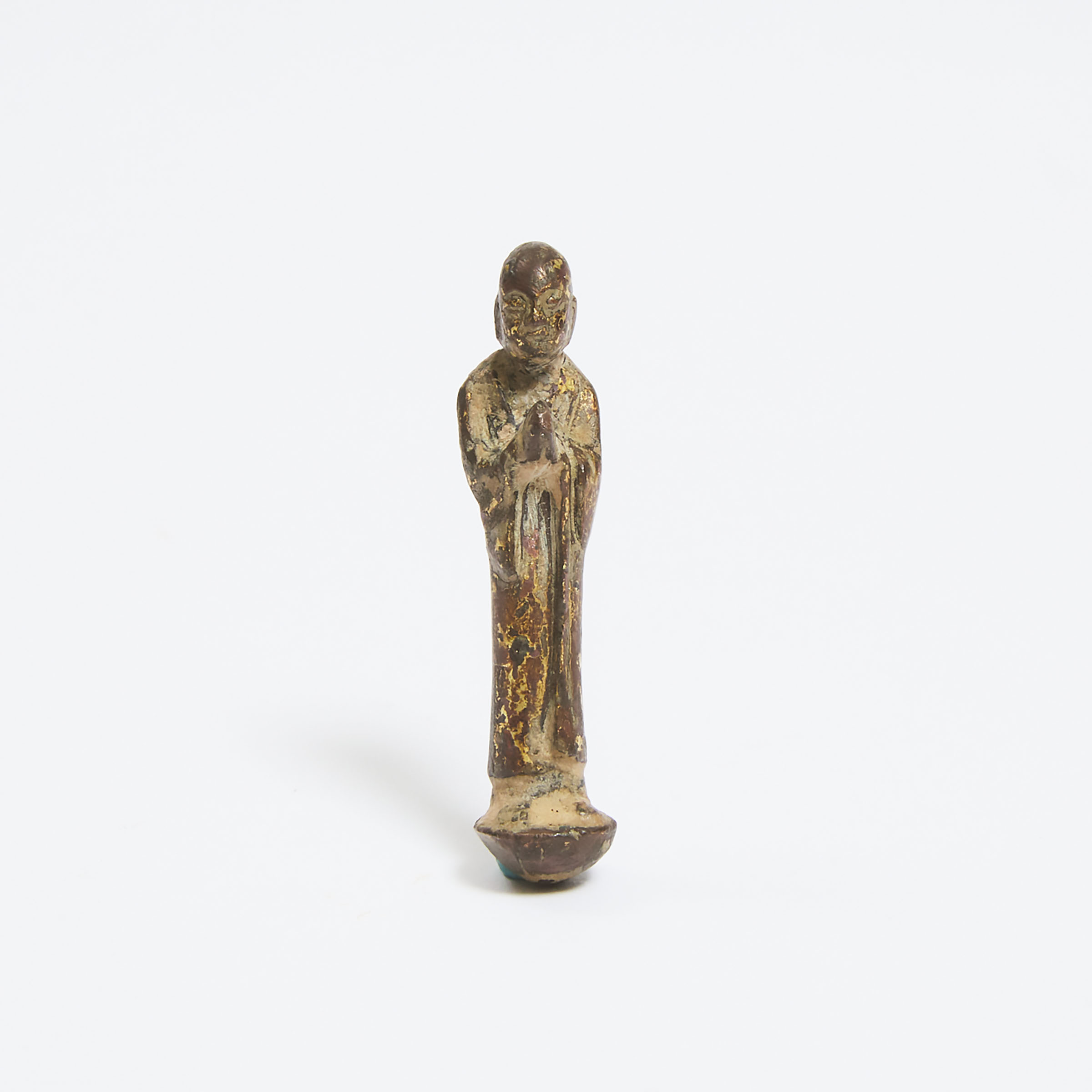 A Miniature Gilt Bronze Figure of a Monk (Ananda), Tang Dynasty (AD 618-907)