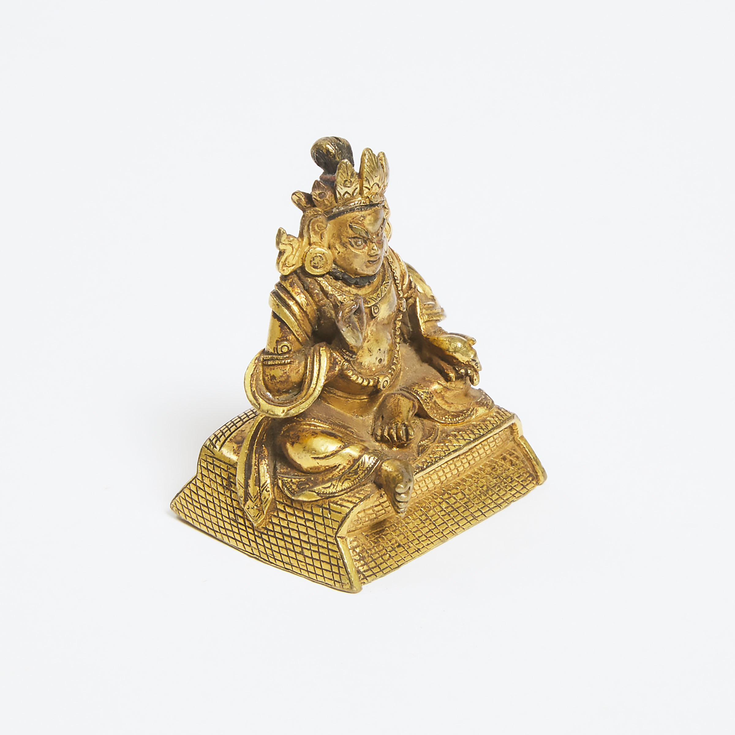 A Small Gilt Bronze Figure of Kubera, Tibet, 18th/19th Century