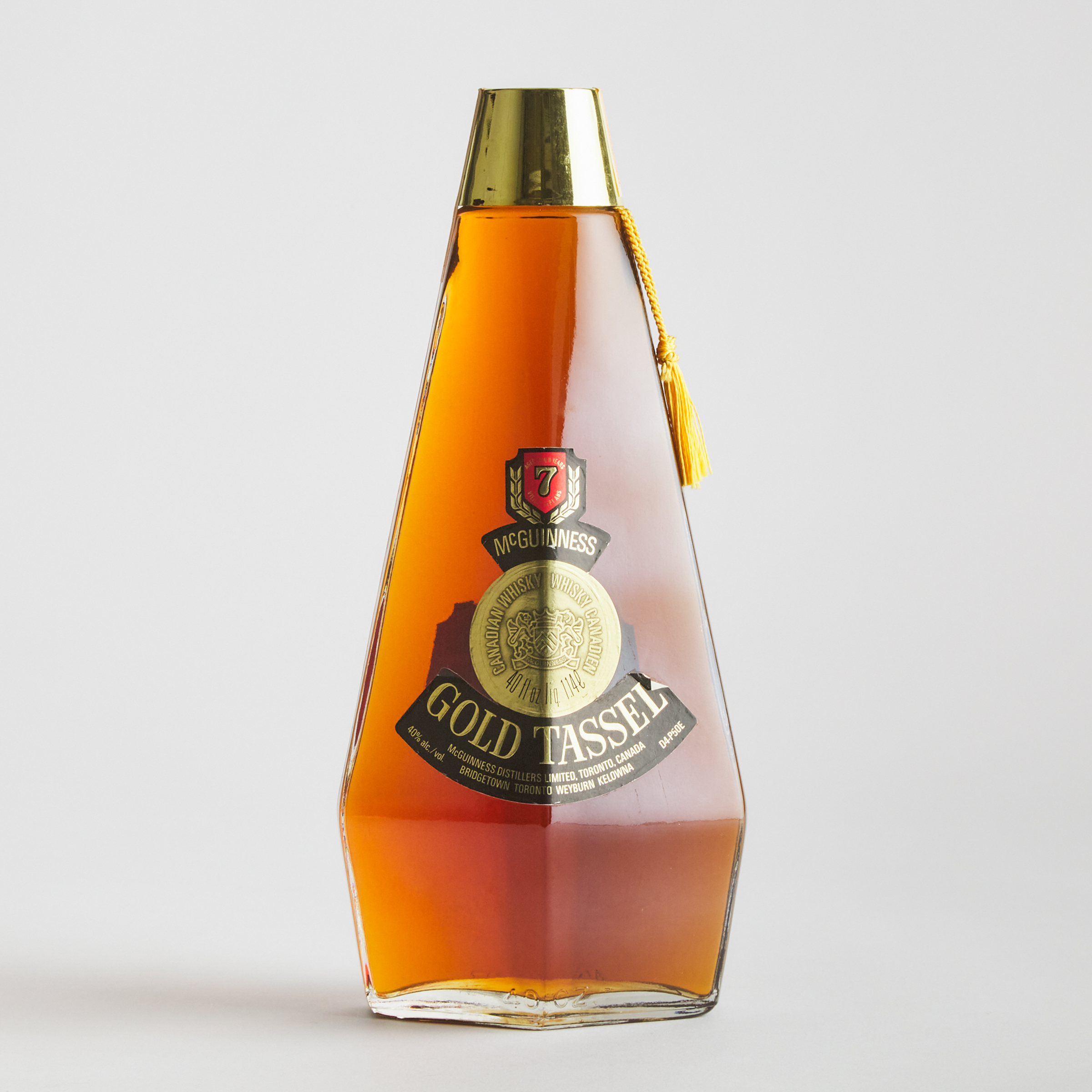 MCGUINESS GOLD TASSEL CANADIAN WHISKY 7 YEARS (ONE 1140 ML)