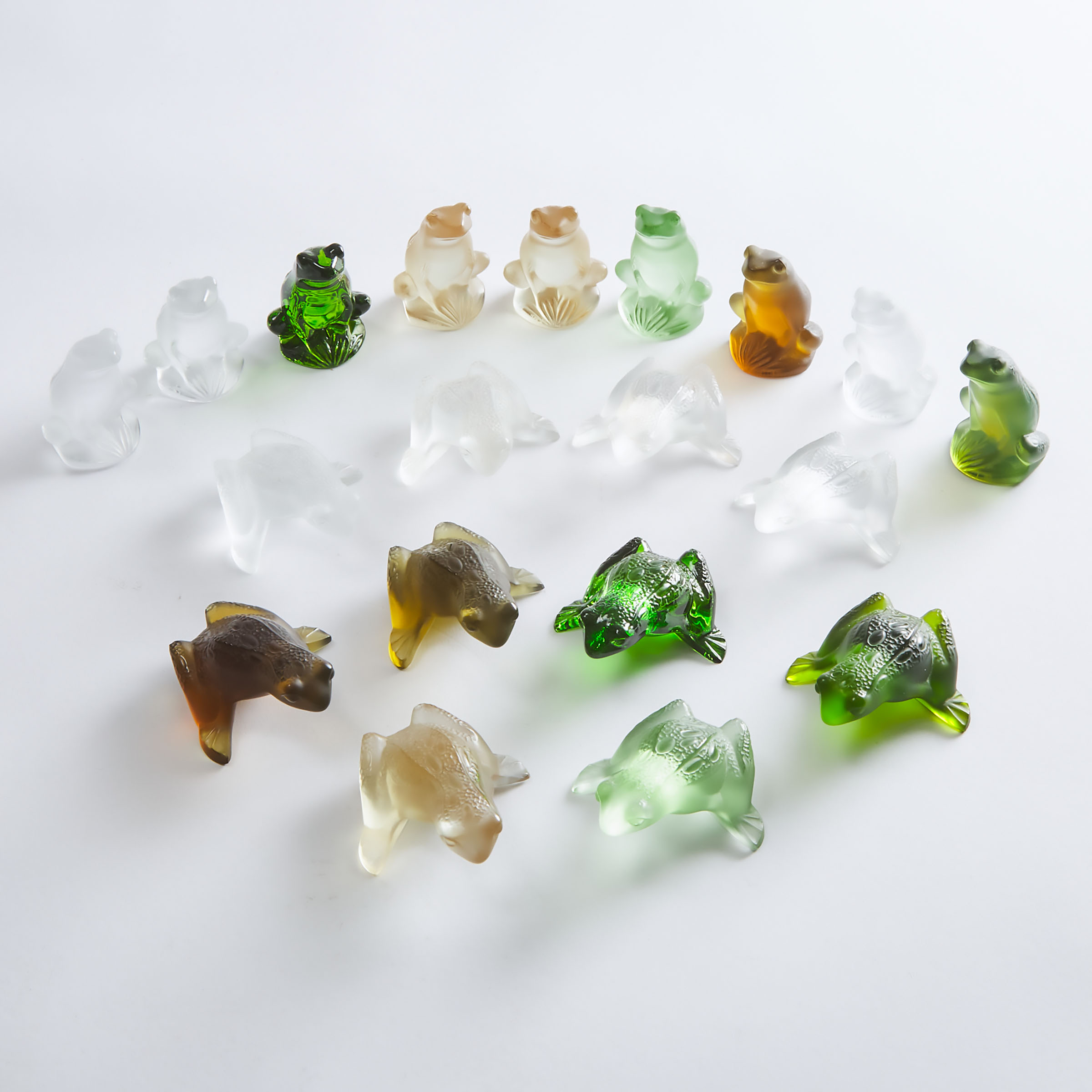 Nineteen Lalique Moulded, Frosted and Mainly Coloured Glass Frogs, post-1978