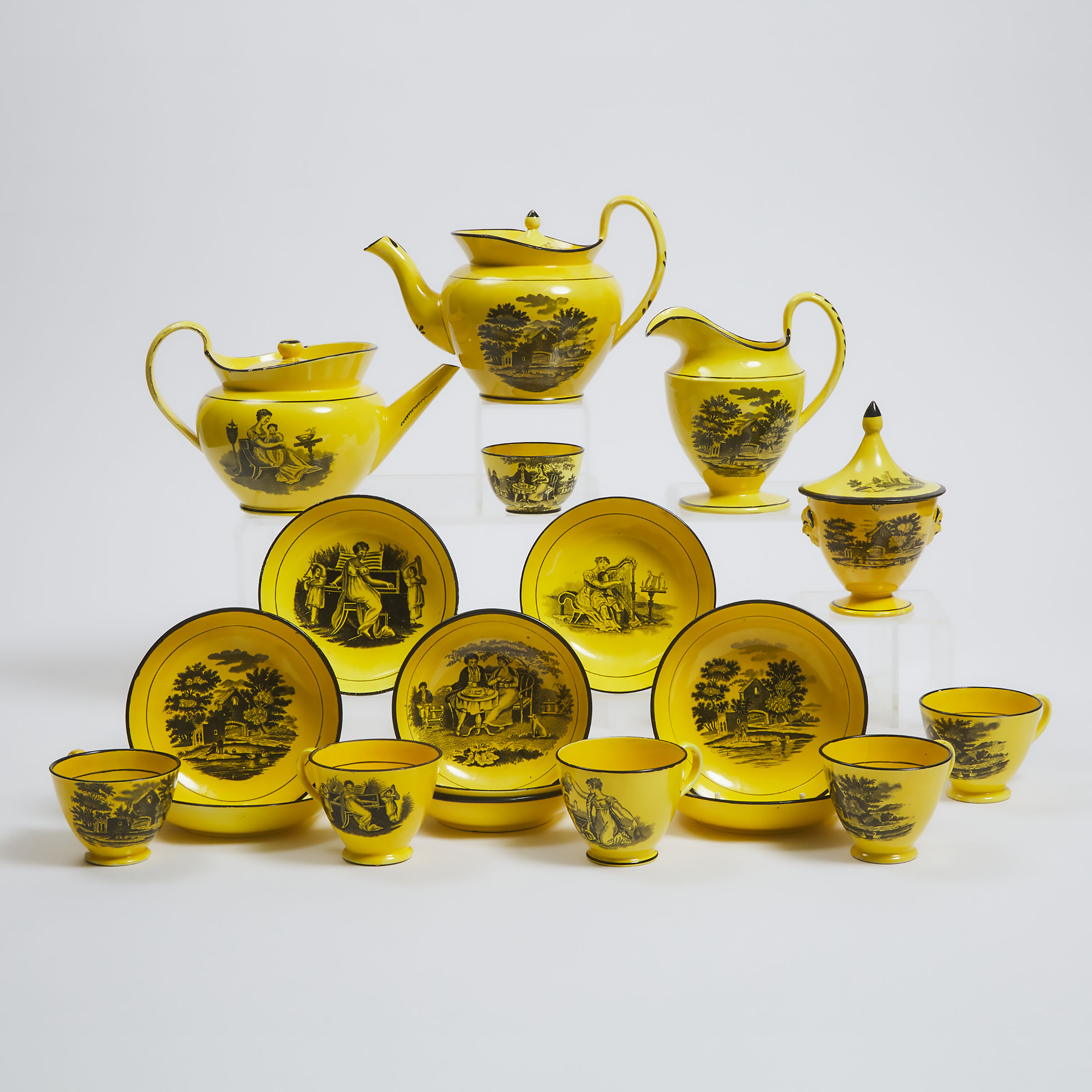 English Black Printed Yellow Ground Earthenware Assembled Tea Service, c.1810-30