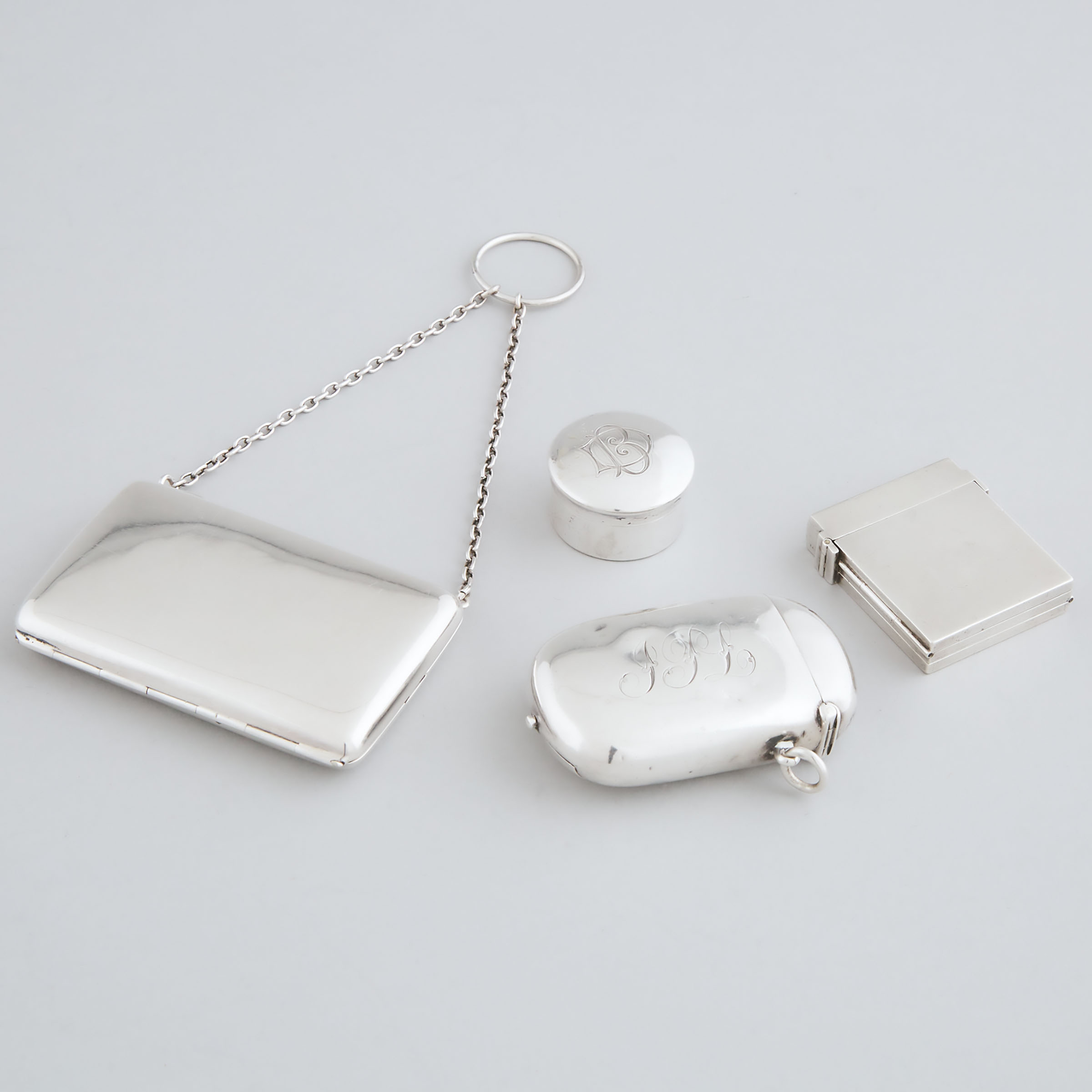 Late Victorian, Edwardian and Later English Silver Small Purse, Circular Box and Two Vesta Cases, c.1898-1916