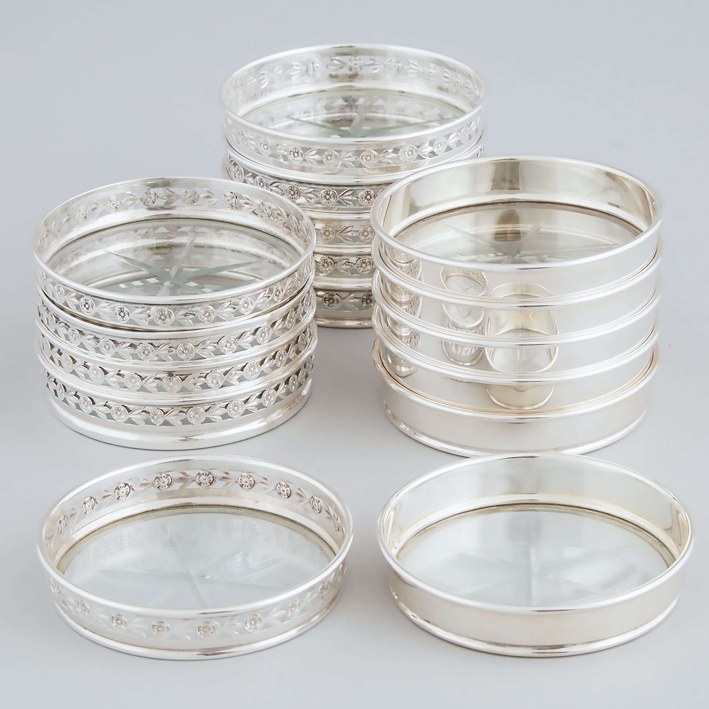 Sixteen Canadian Silver Mounted Cut Glass Coasters, Henry Birks & Sons, Montreal, Que., 20th century