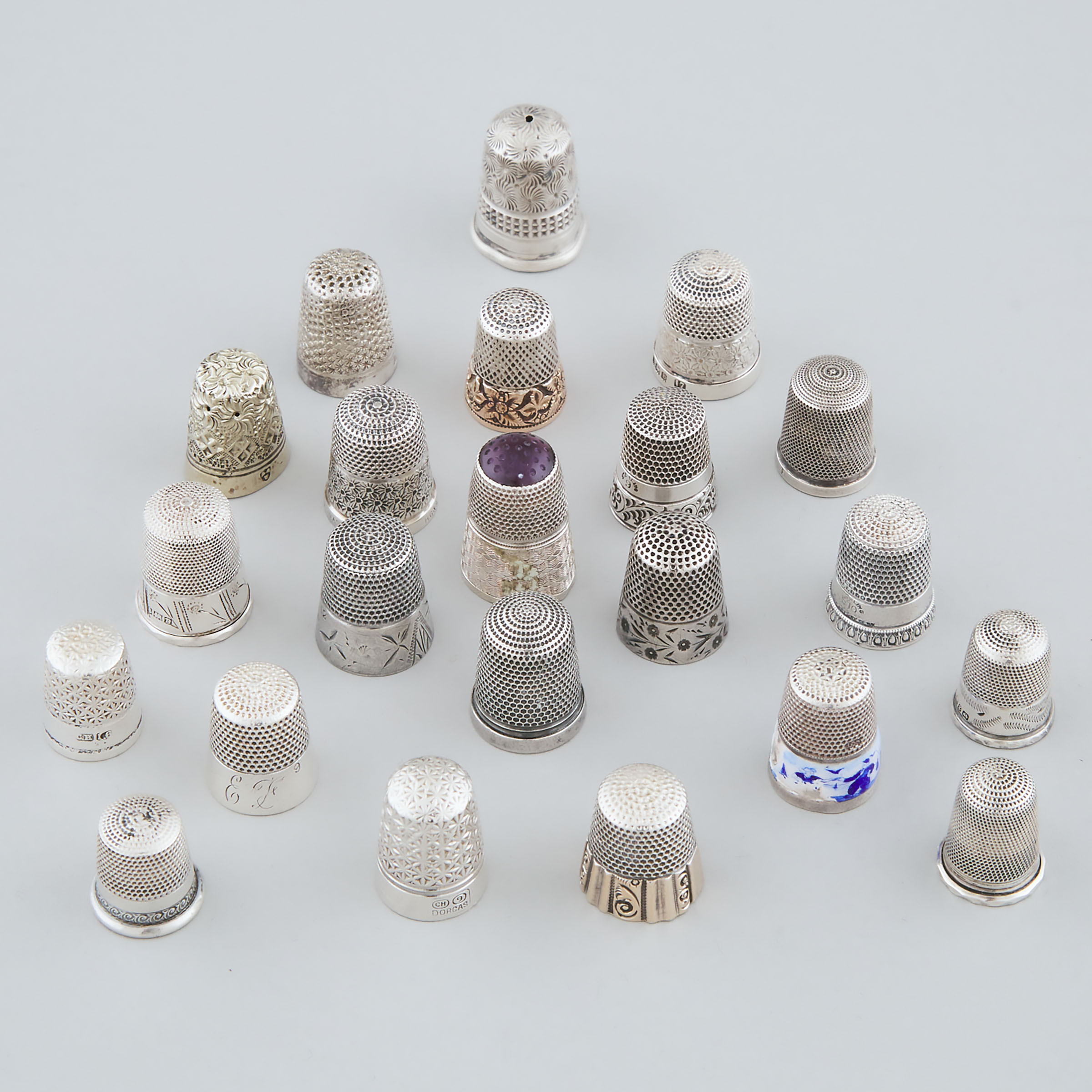 Twenty-Two Various Mainly Silver Thimbles, late 19th/20th century