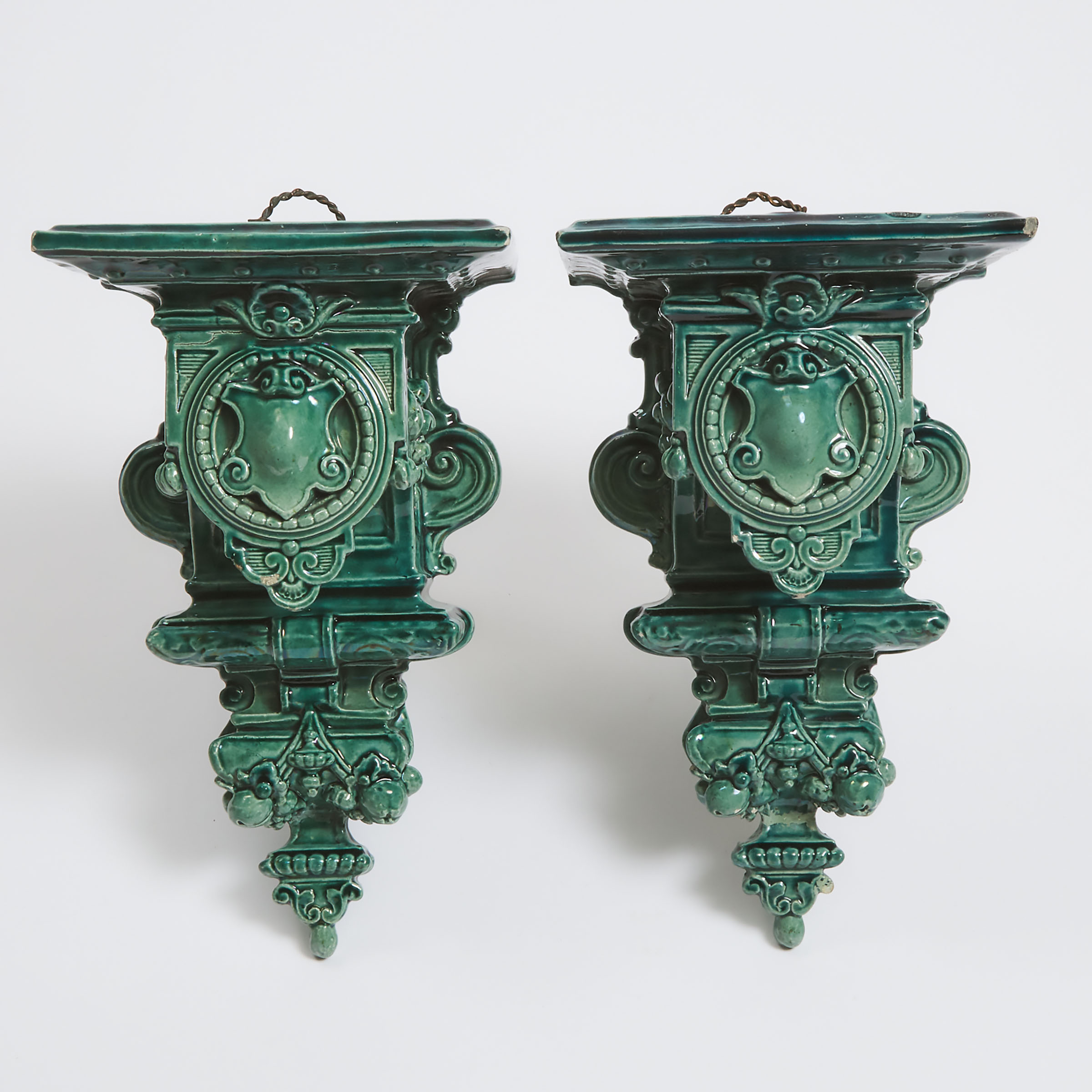 Pair of Continental Turquoise Majolica Glazed Wall Brackets, late 19th century