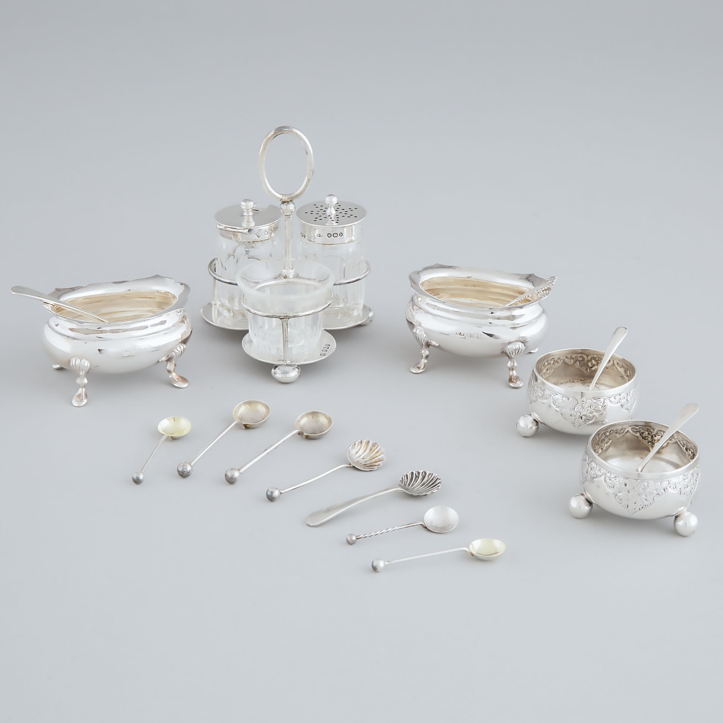 Victorian and Later English Silver Condiment Cruet, Two Pairs of Salt Cellars and Eleven Salt Spoons, late 19th/20th century