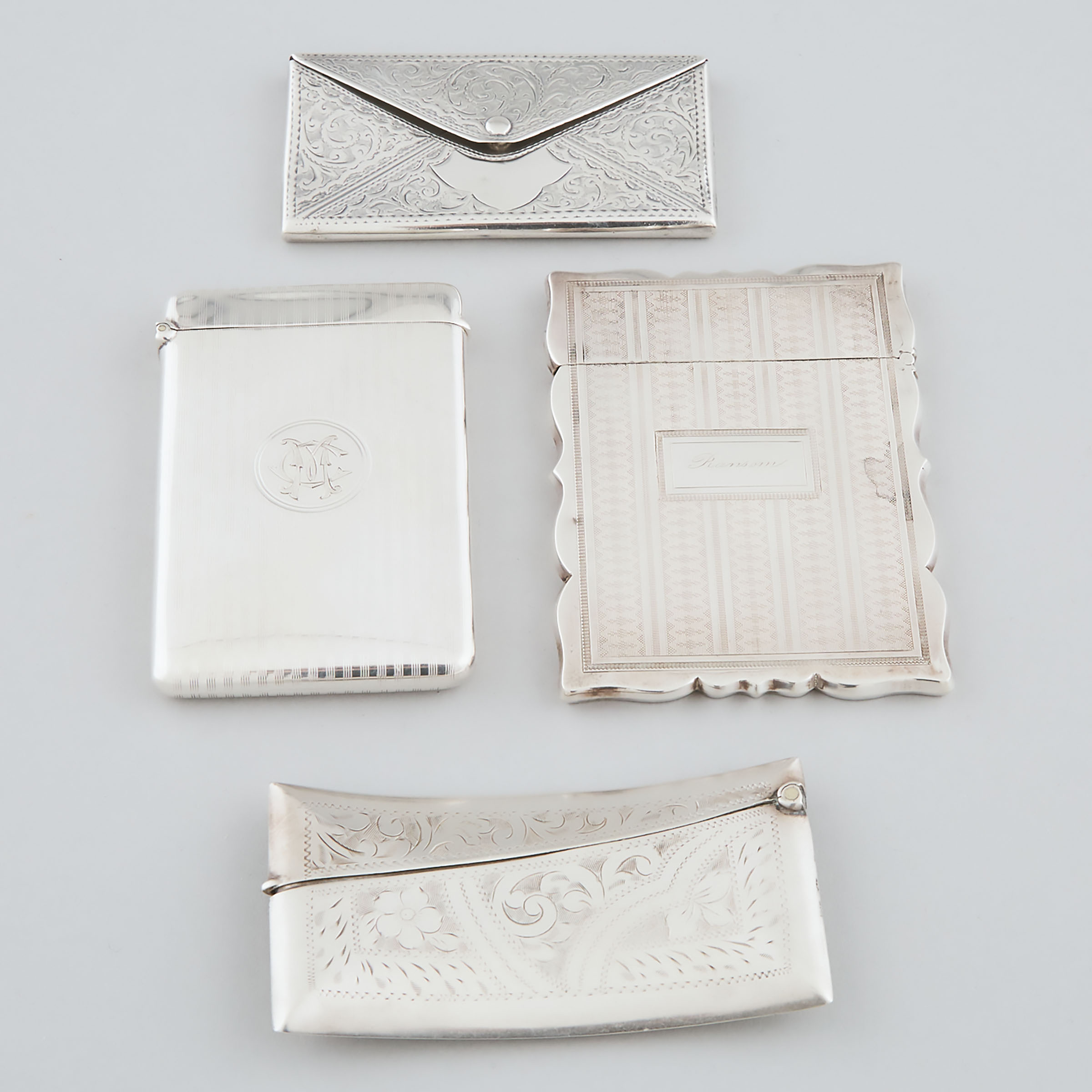 Four Edwardian and American Silver Card Cases, late 19th/early 20th century