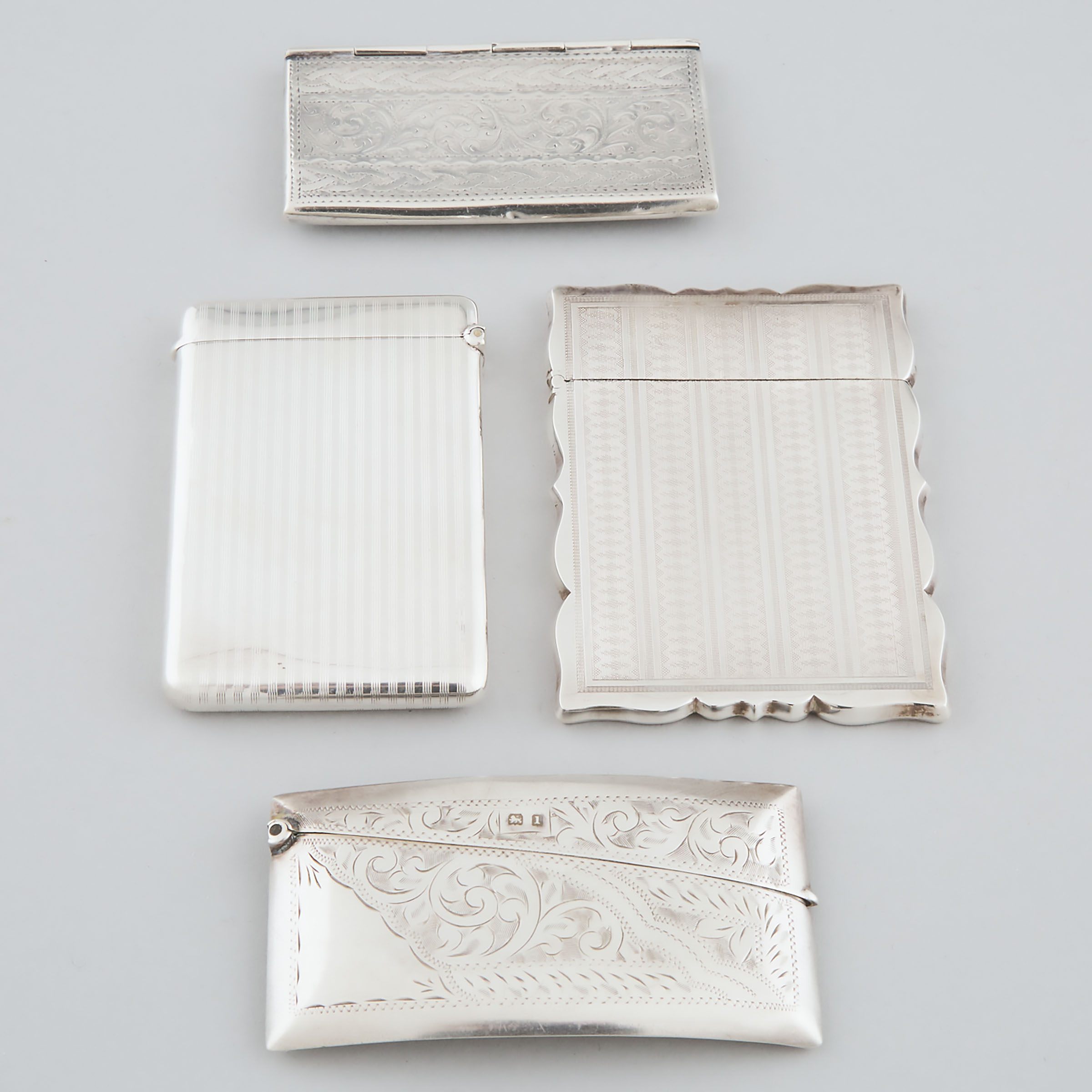 Four Edwardian and American Silver Card Cases, late 19th/early 20th century